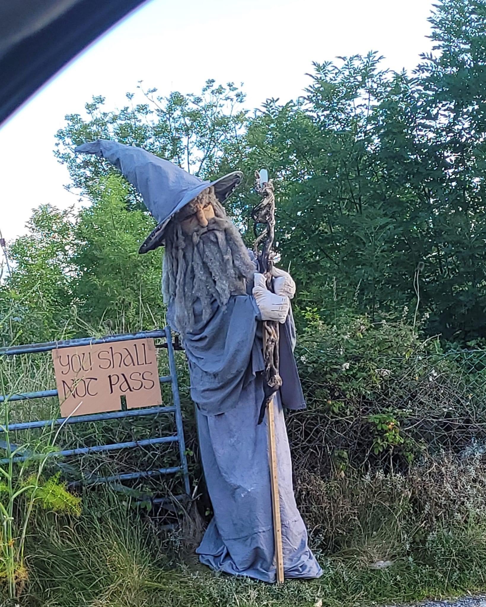 A scarecrow figure of Gandalf from Lord of the Rings