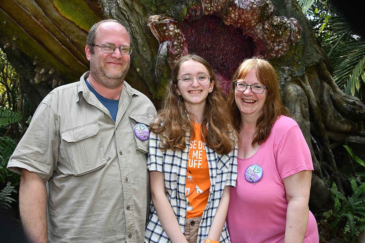 Bea Baldwin standing with her parents Sarah and Joe