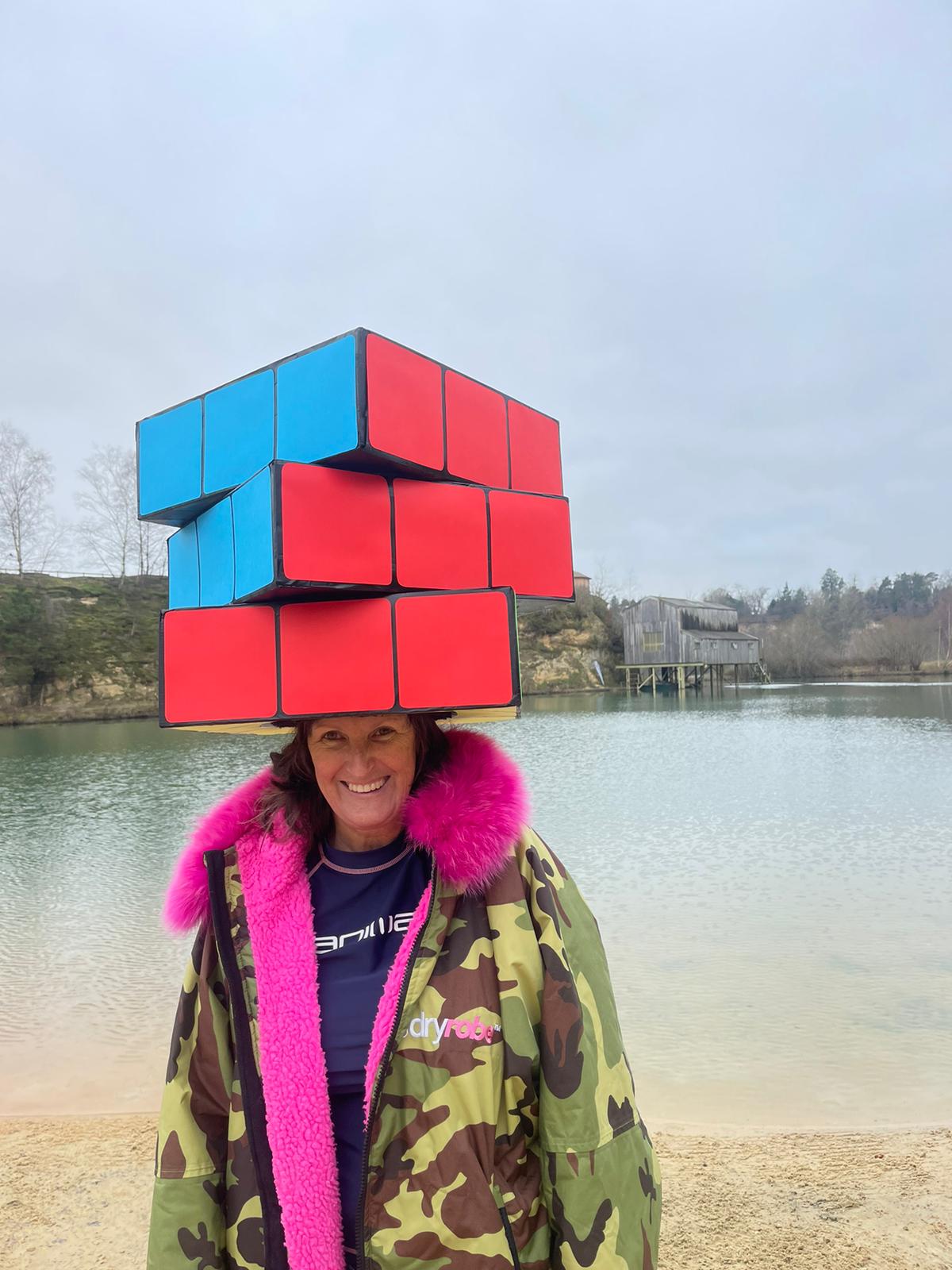 Rubik's cube on someone's head 