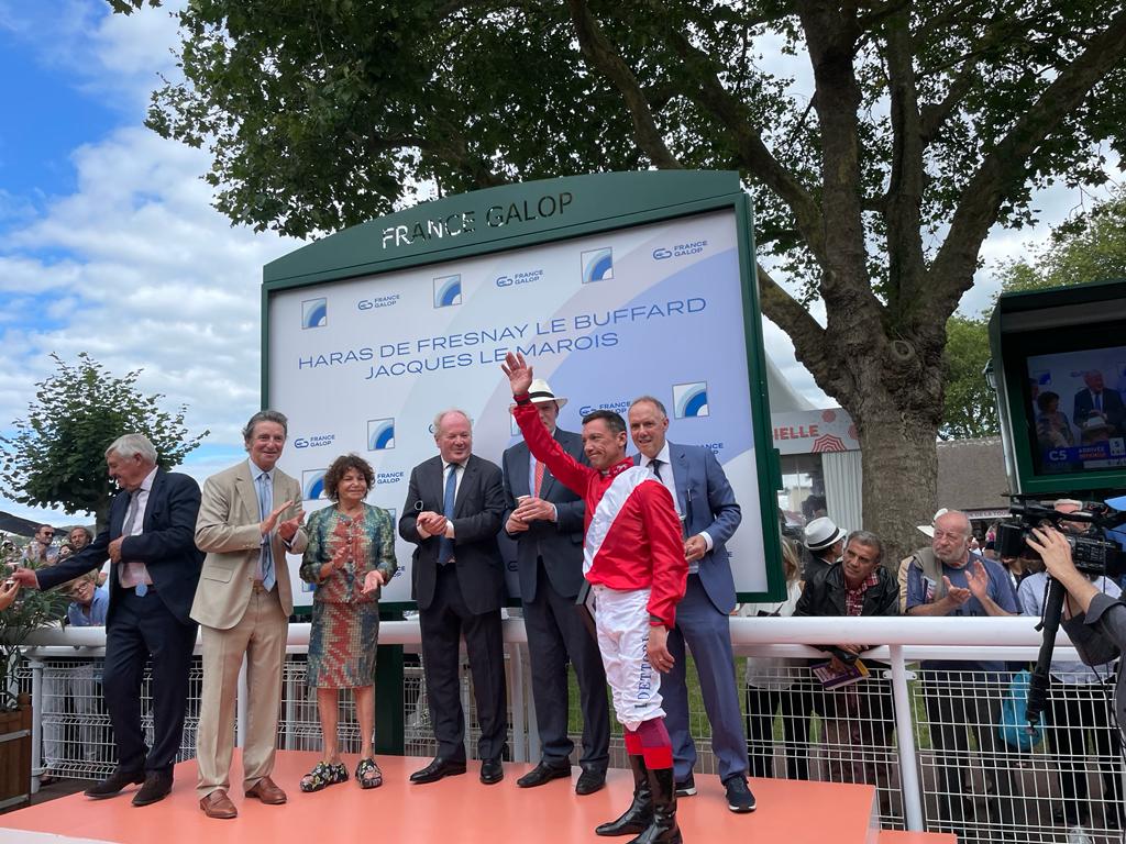 Frankie Dettori hails the Deauville crowd after an inspired ride