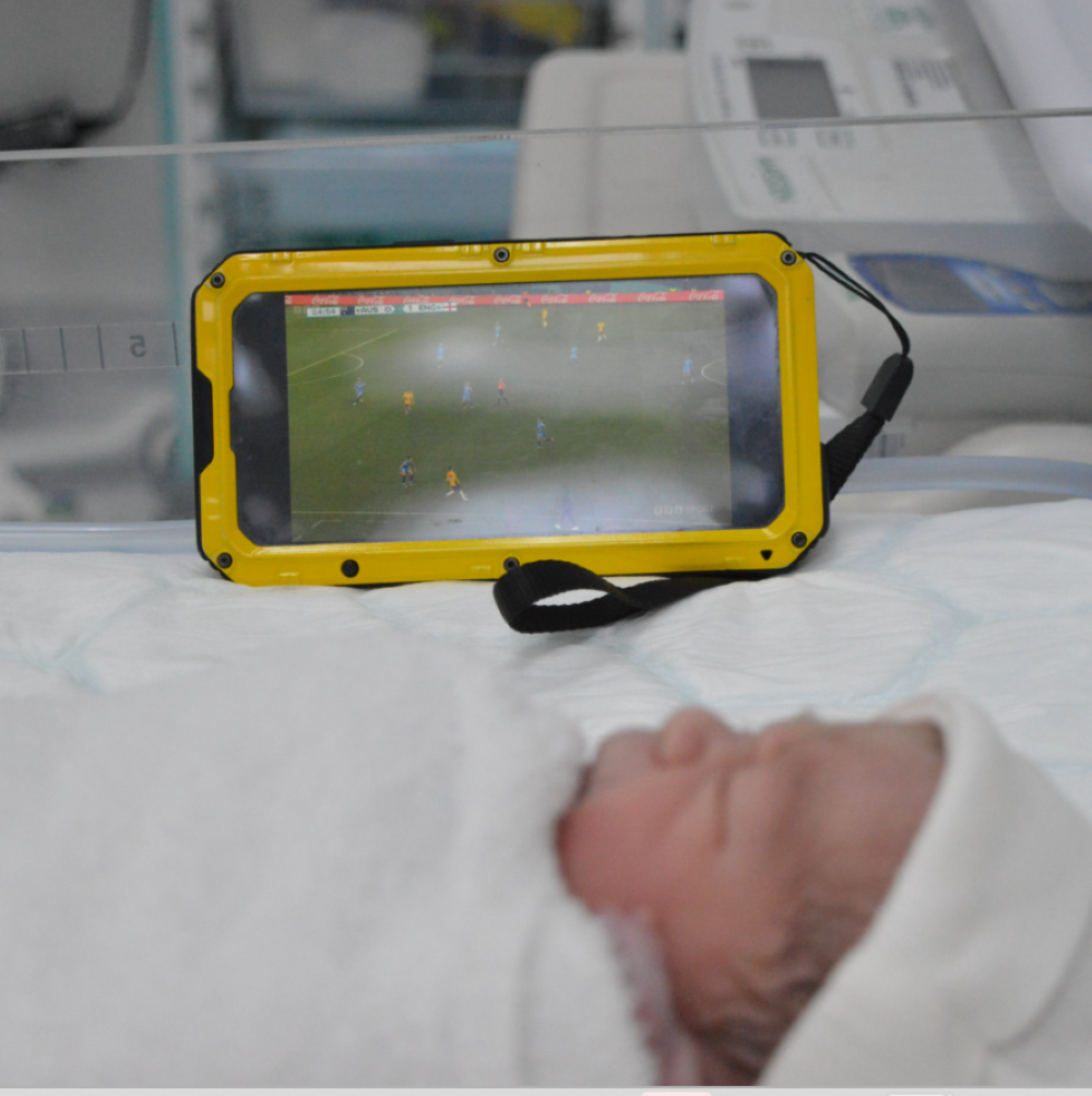 BBC sports reporter, Matt Graveling's new-born baby listening to the second half of England's match against Australia