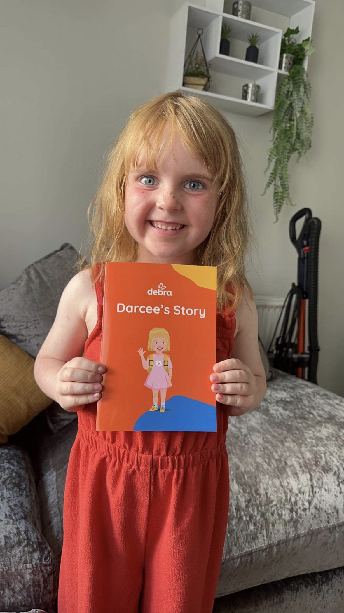 Darcee Birrane with her book