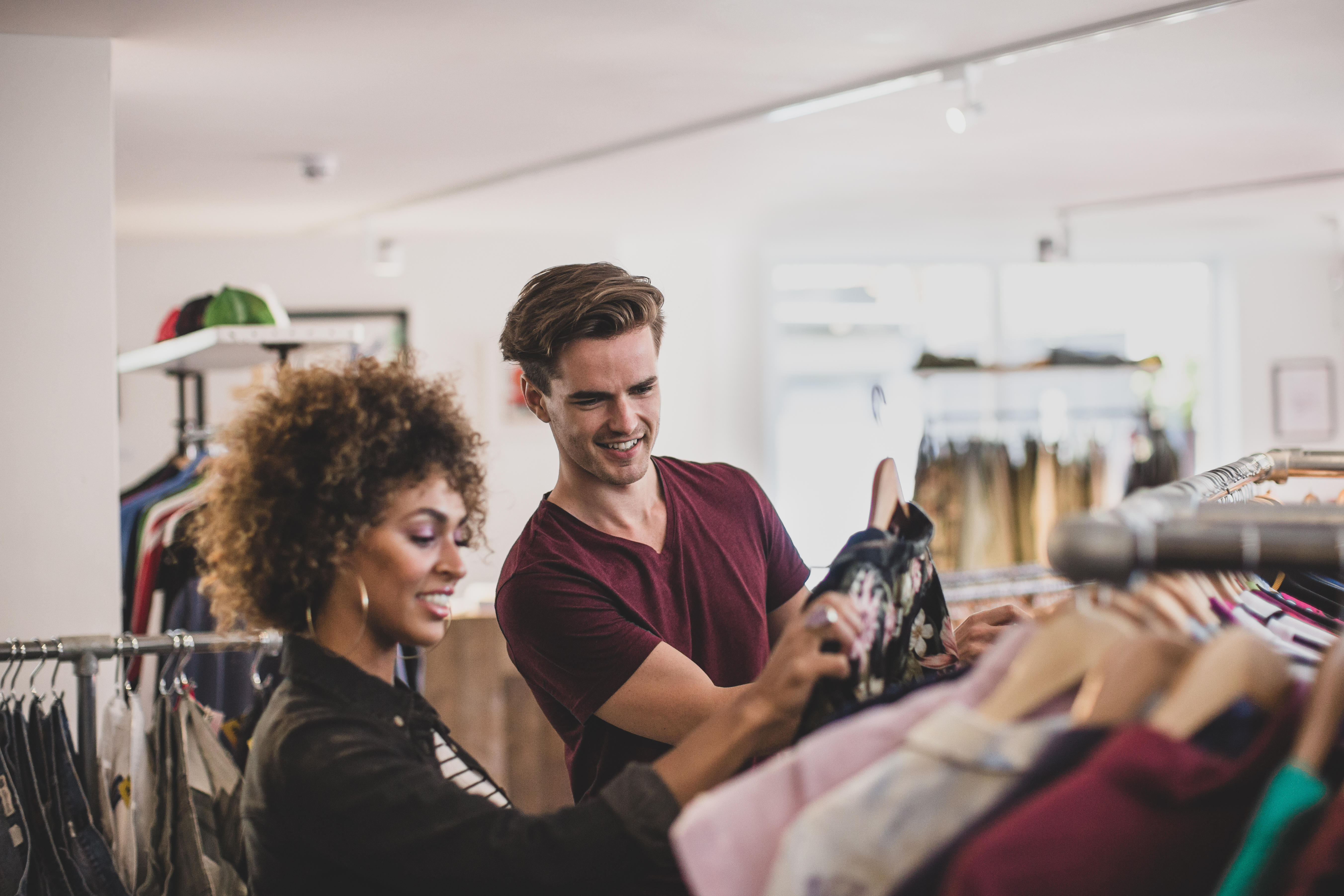 couple in a vintage clothing store