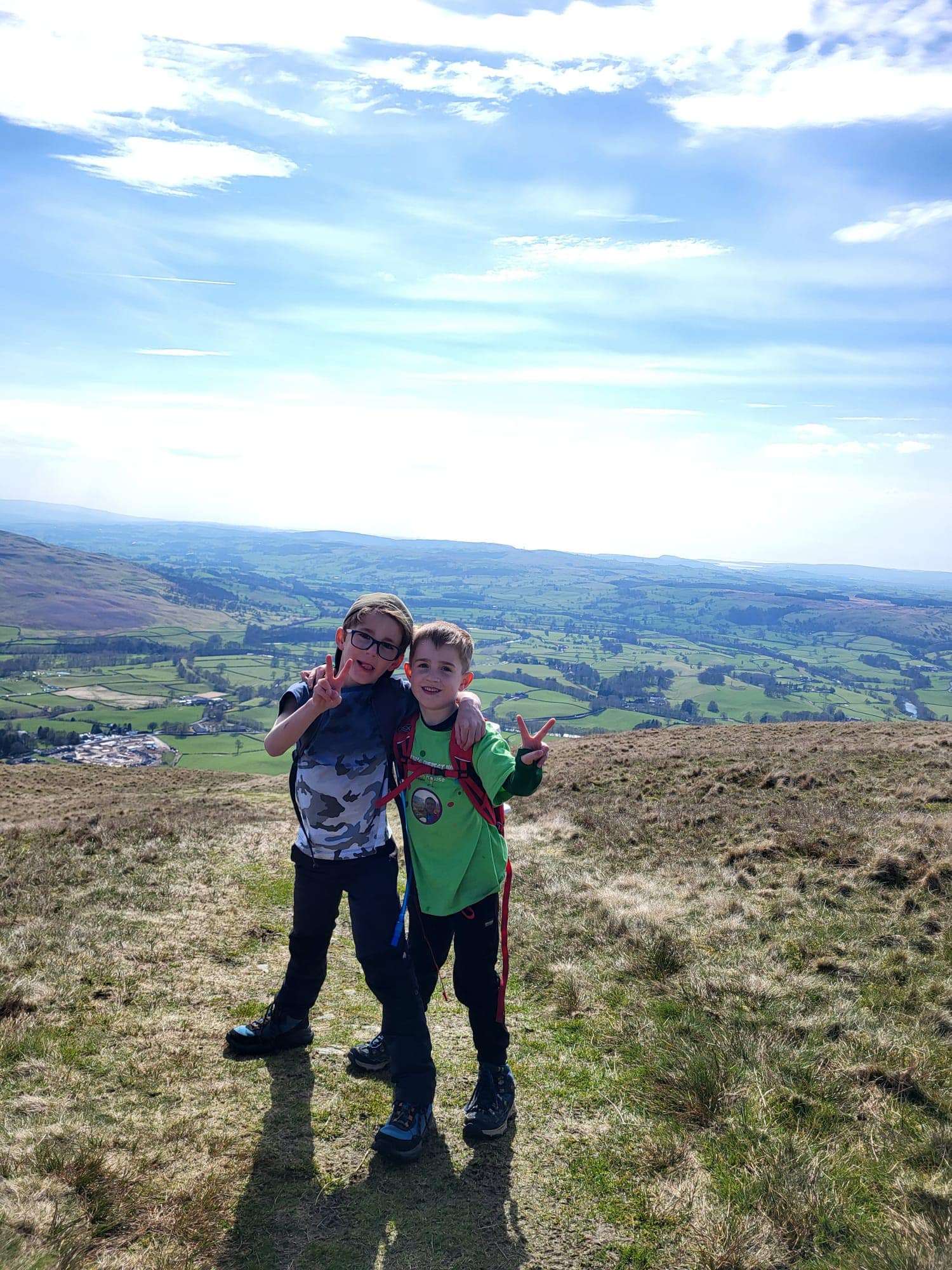 Two boys standing together and smiling