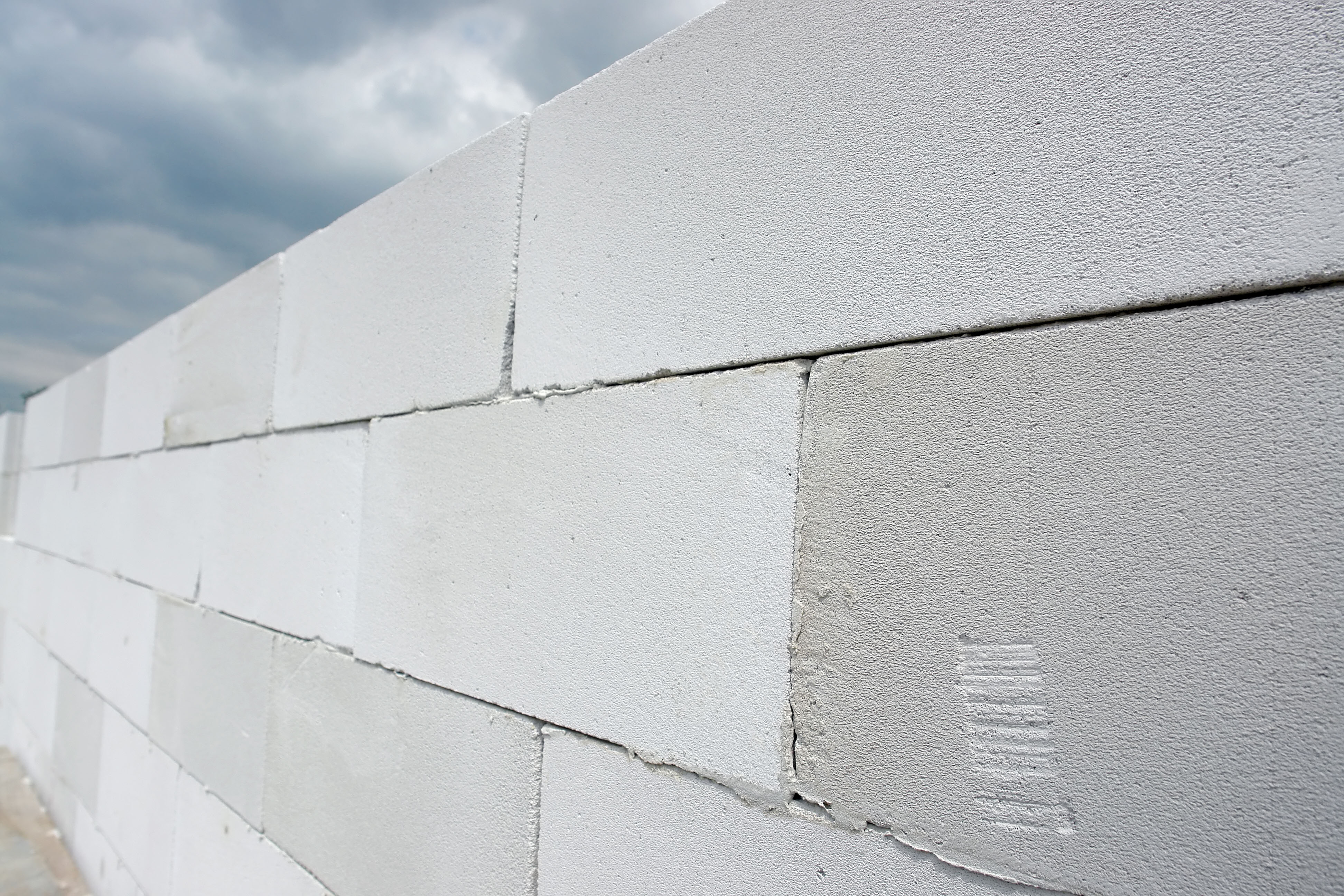 Wall made from white aerated autoclaved concrete blocks