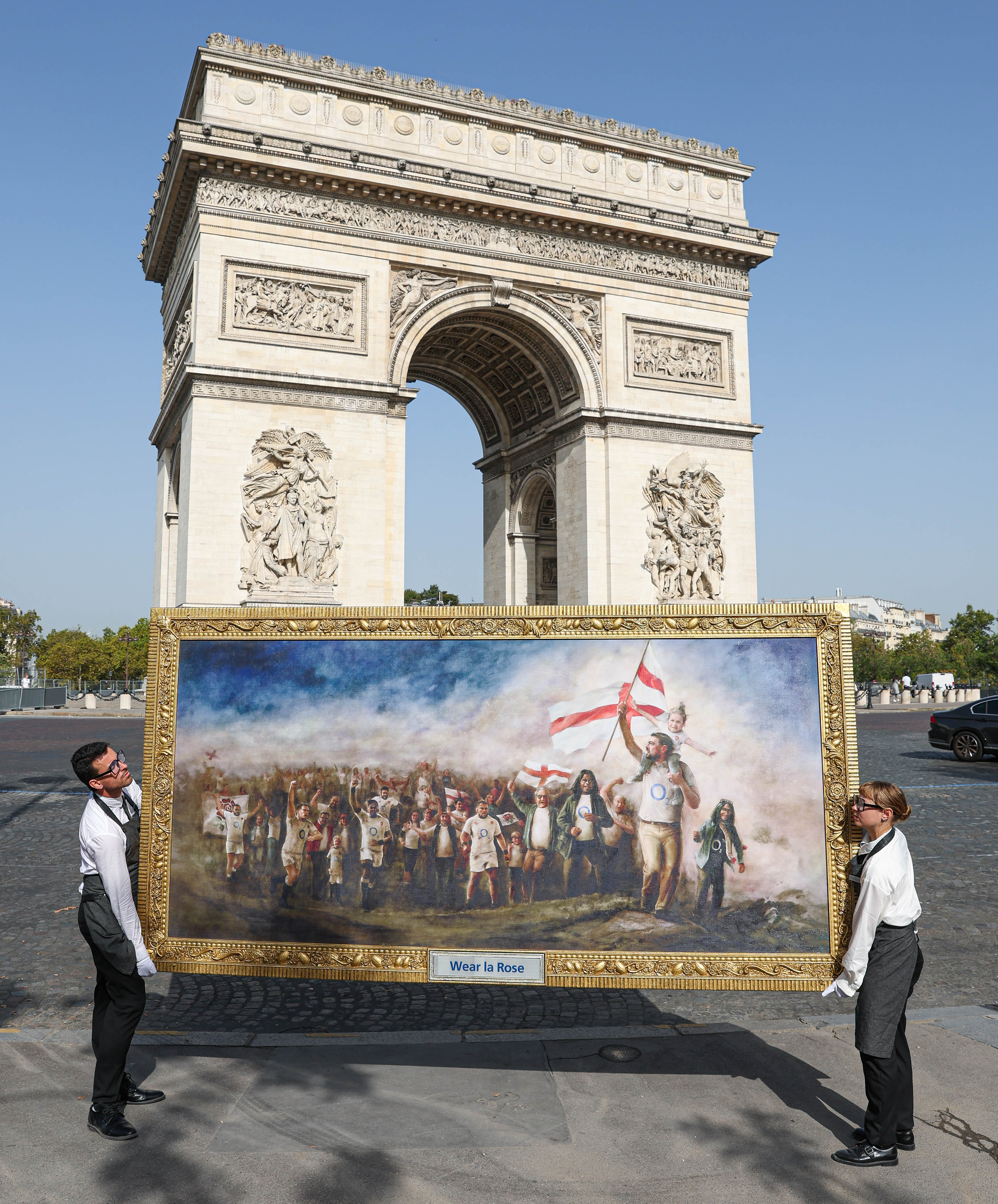 Artwork displayed in front of the Arc de Triomphe in Paris, France