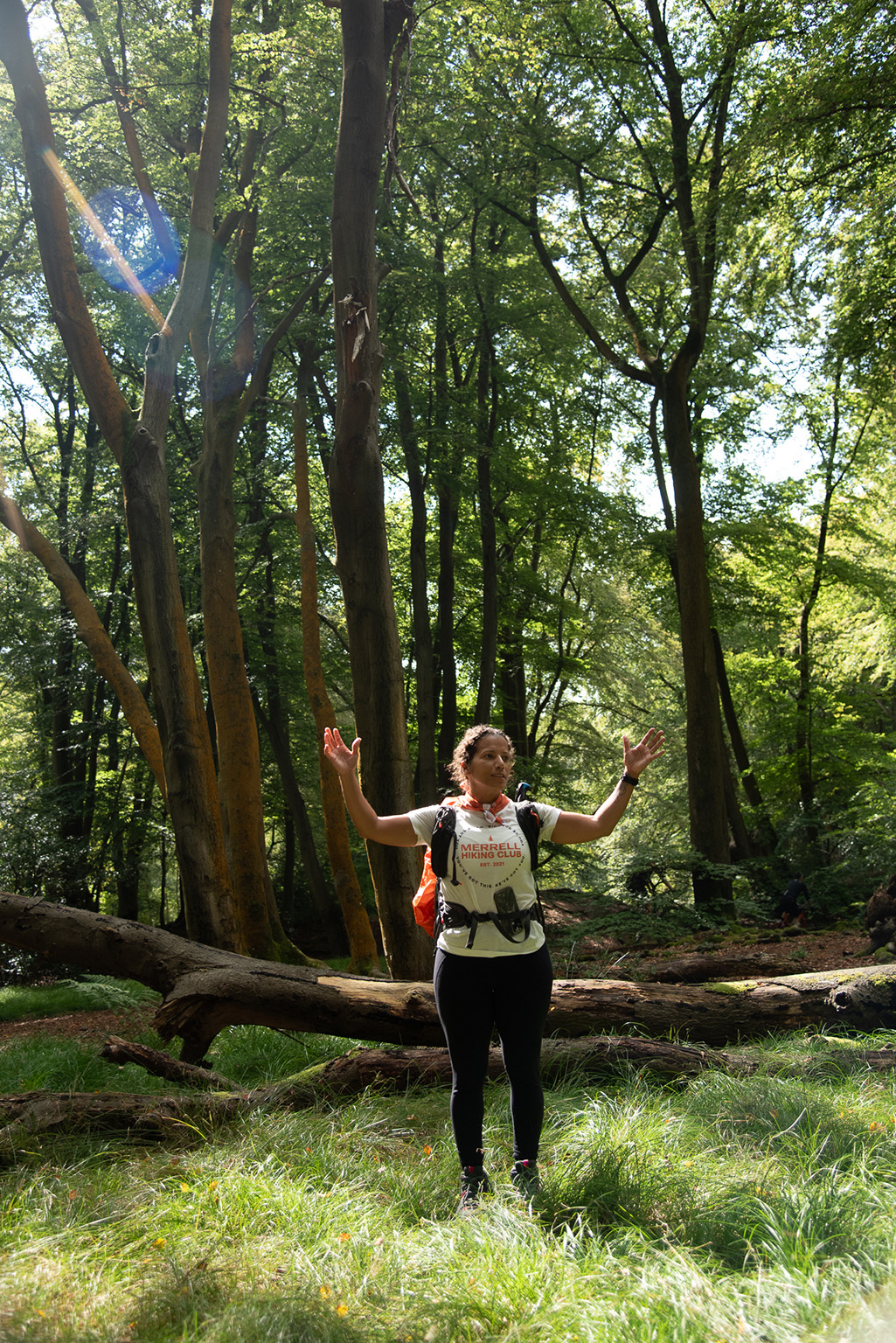 Woman standing with her arms outstretched 