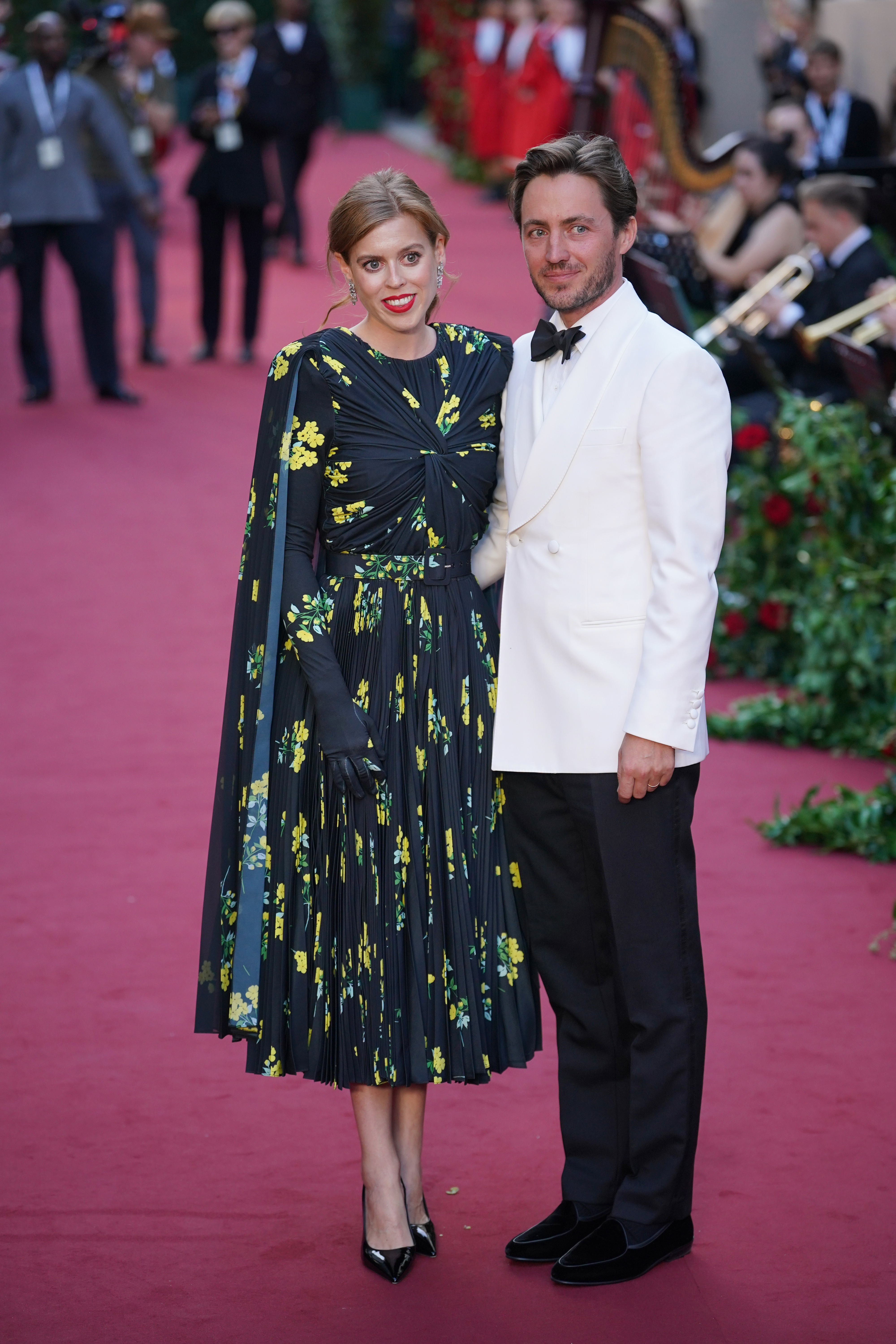 Sienna reveals her bare baby bump in Schiaparelli on the Vogue