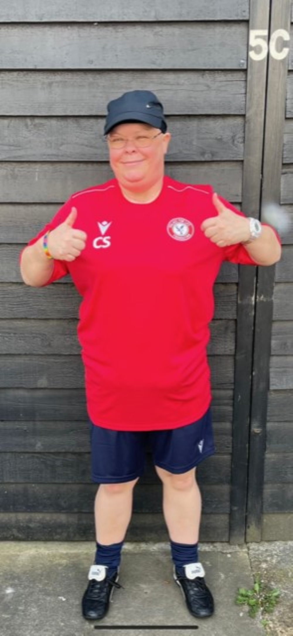 Claire Stork wearing her football teams' shirt