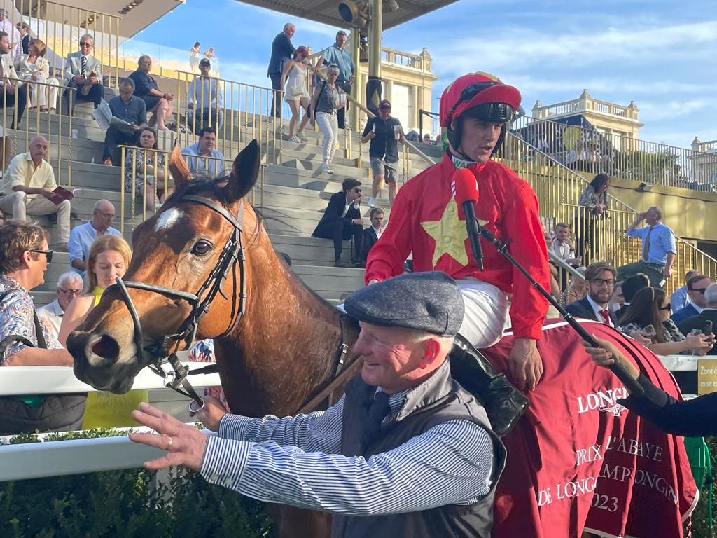 Jason Hart returns to the winner's enclosure aboard Highfield Princess