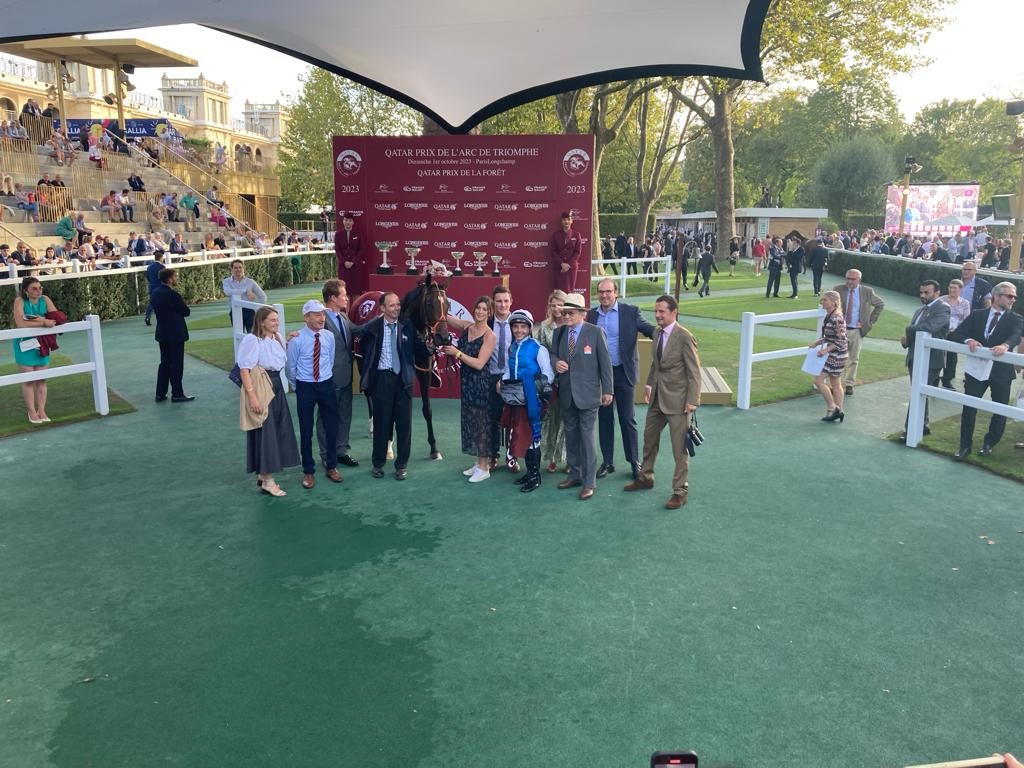 Connections of Kelina celebrate after the Prix de la Foret