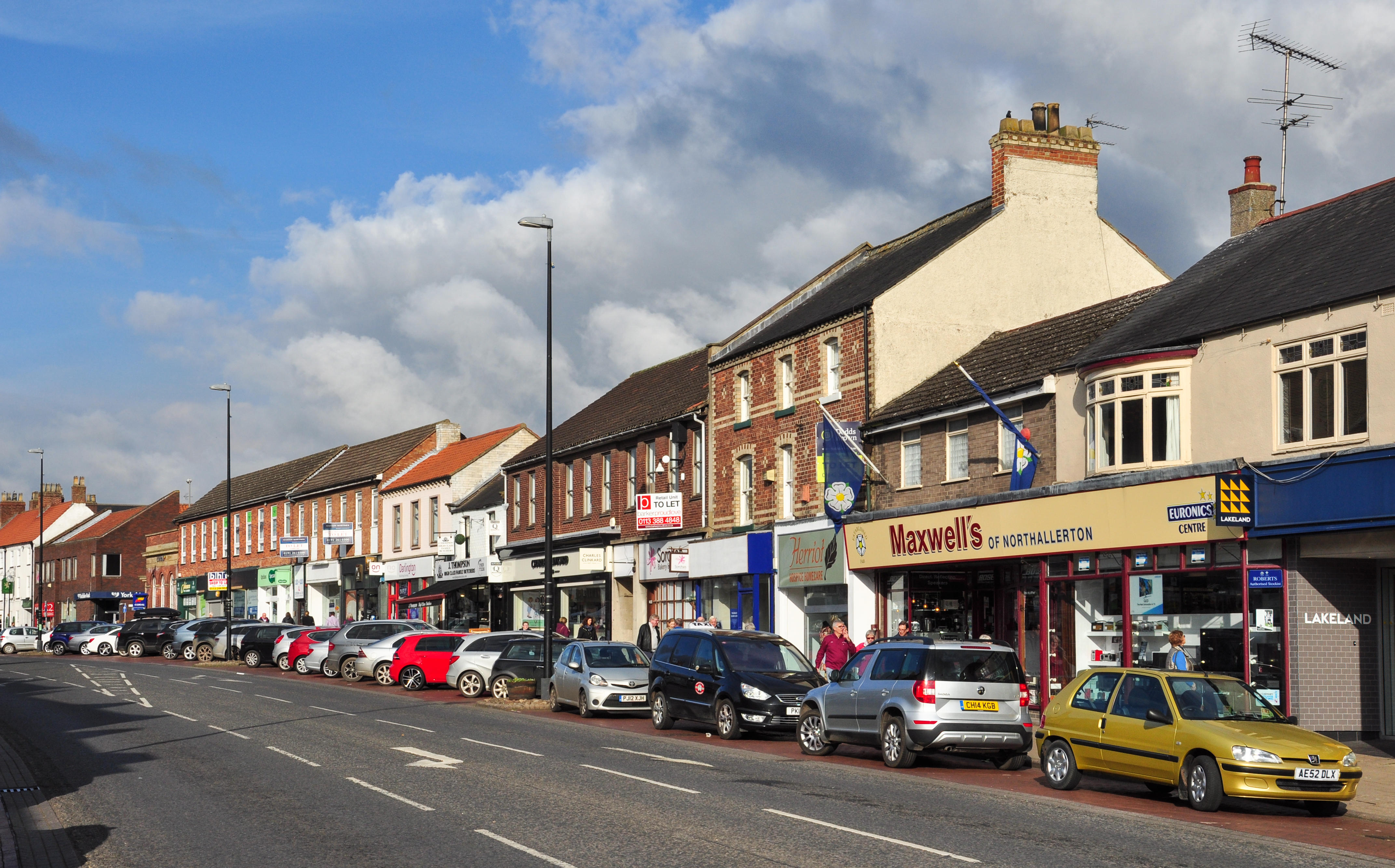 Cars parked along high street