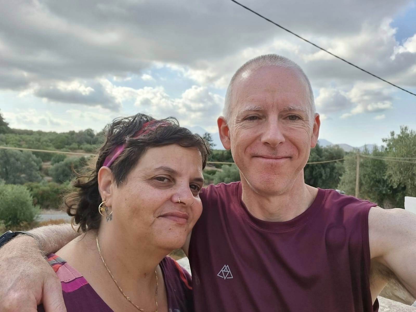Ben and his wife Meyrav smiling for a photo 