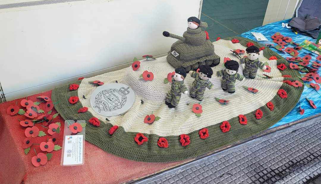 Tank and soldiers on postbox 