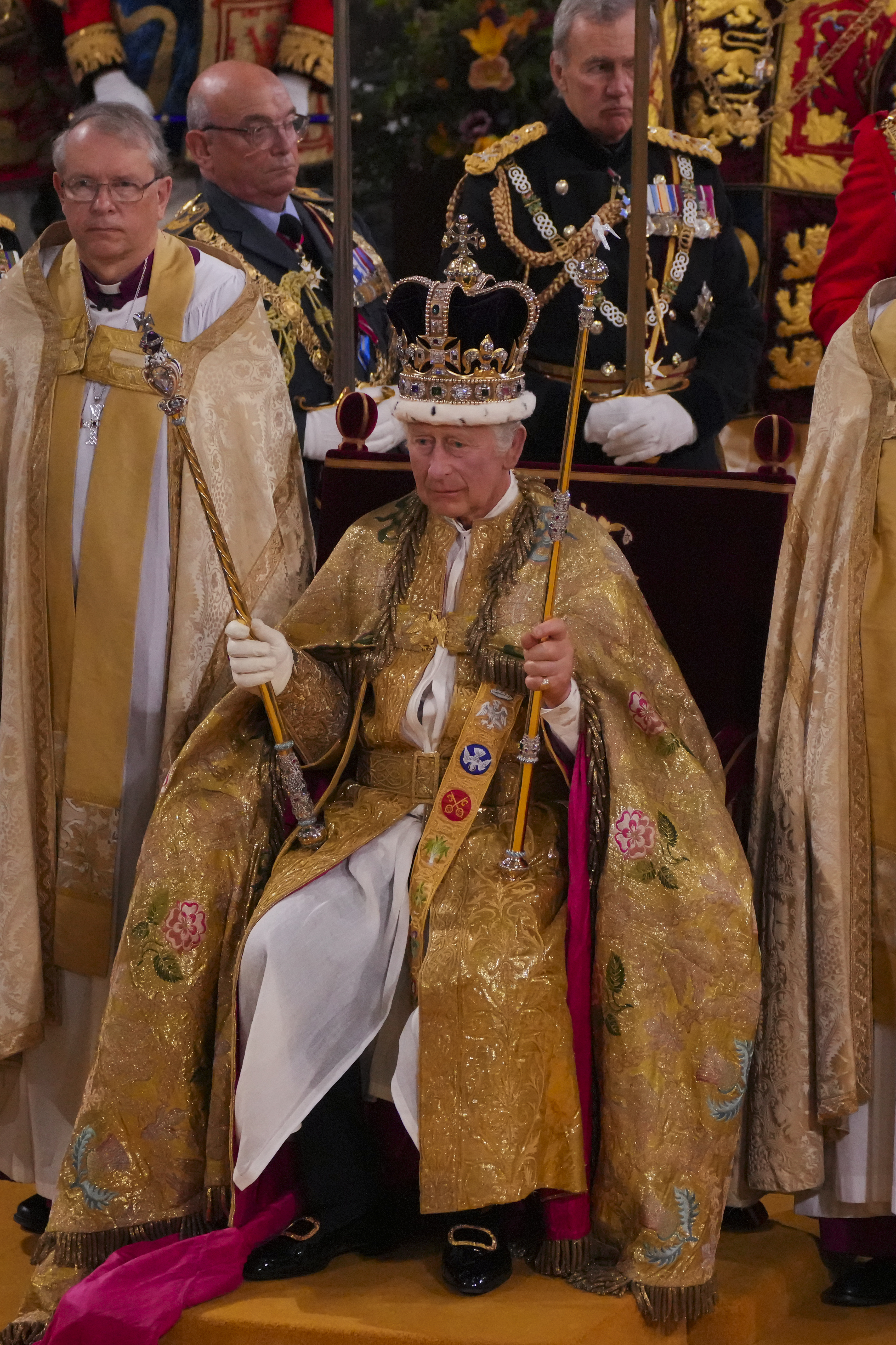King Charles III seated in the coronation chair, wearing St Edward's Crown 