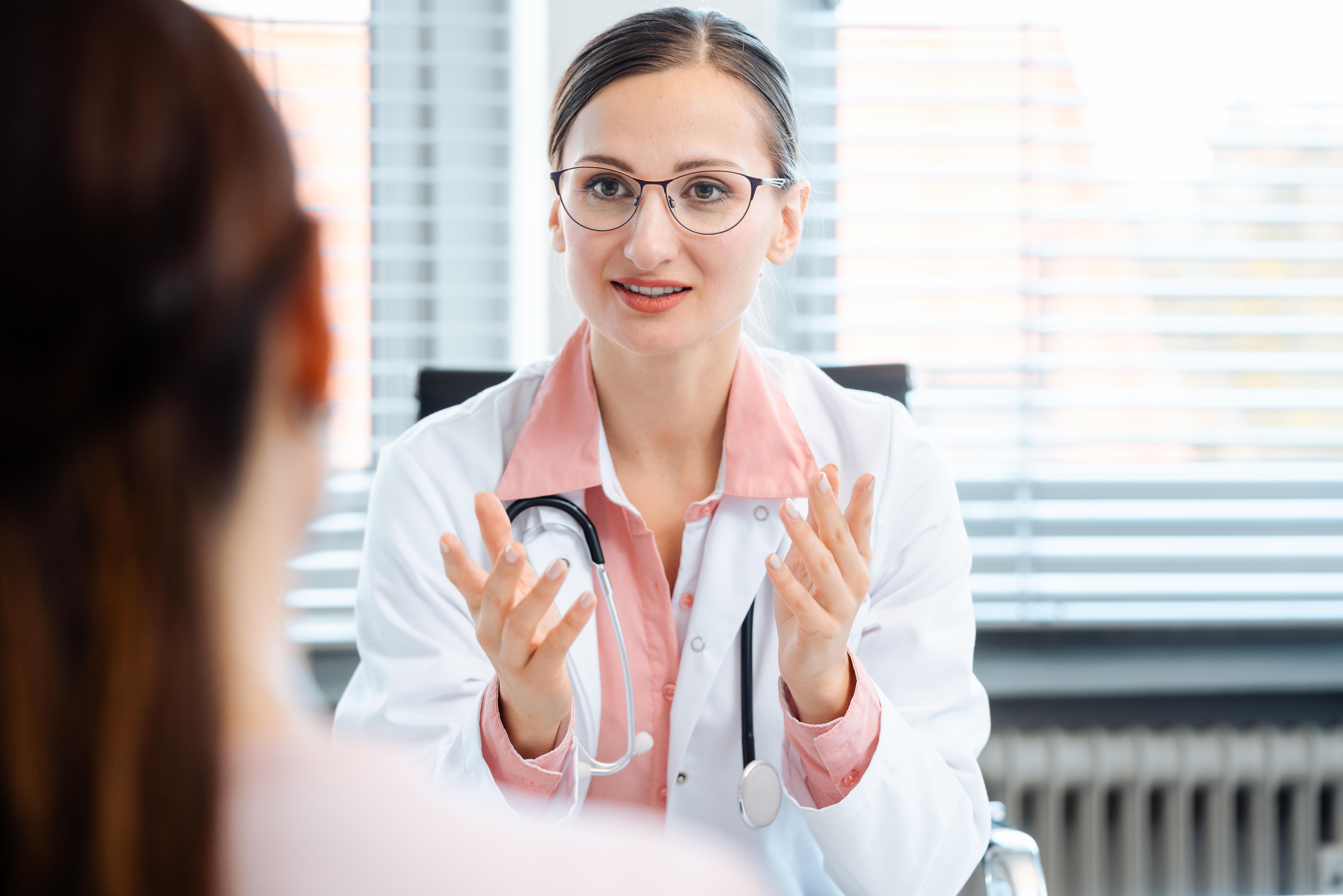 Woman having GP appointment