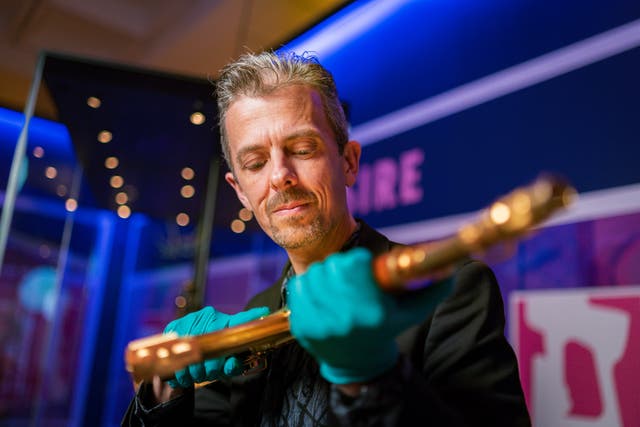 Golden AK-47 linked to Saddam Hussein going on display for the first ...