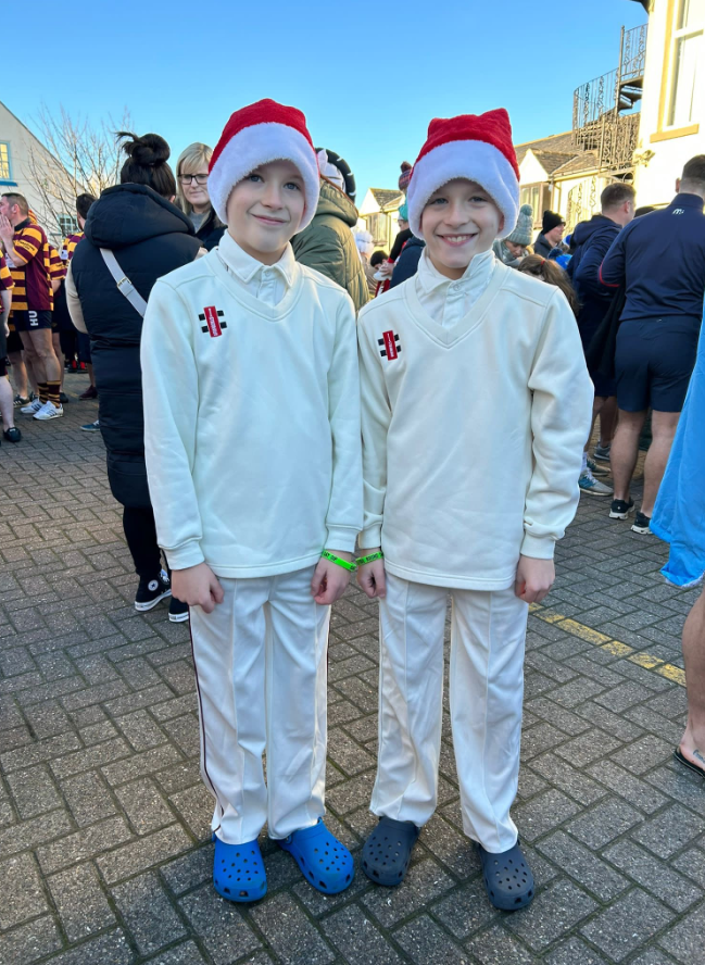 Two boys standing together