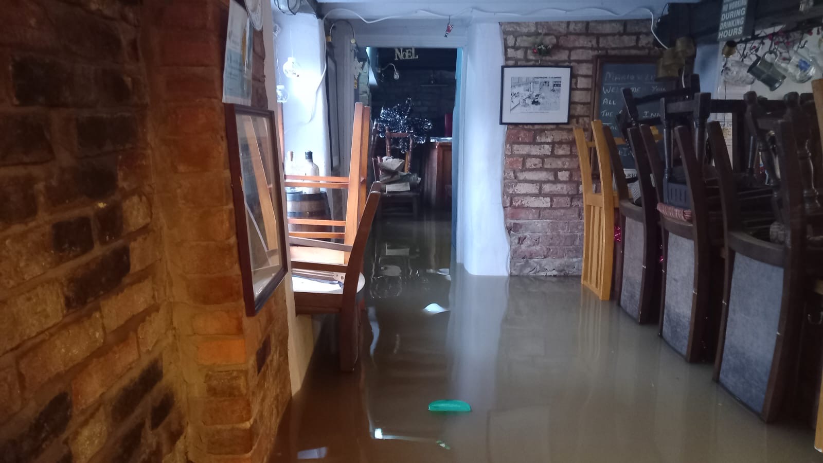 Inside The Boat Inn with high water