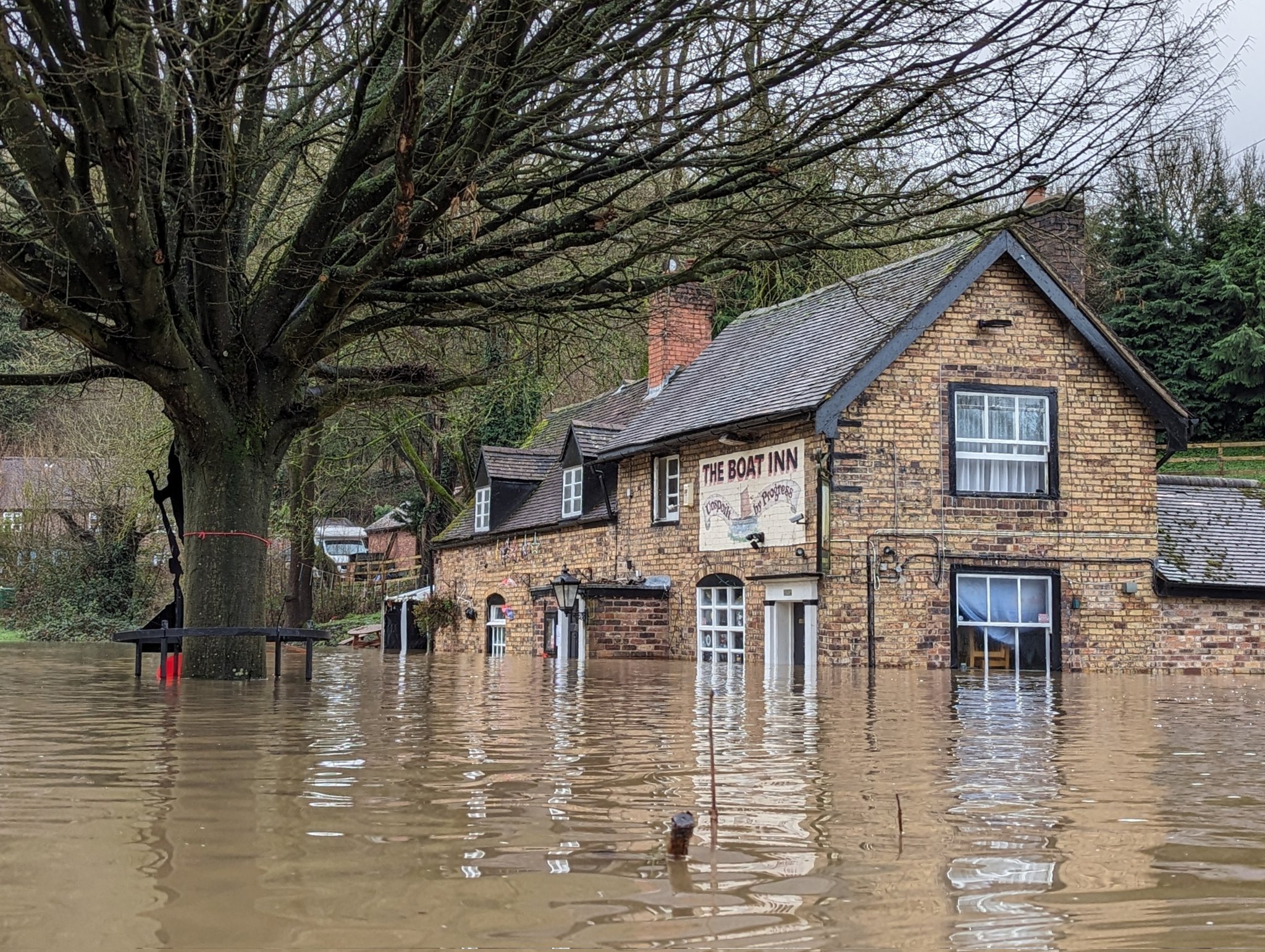A view of the pub from outside with heavy flooding