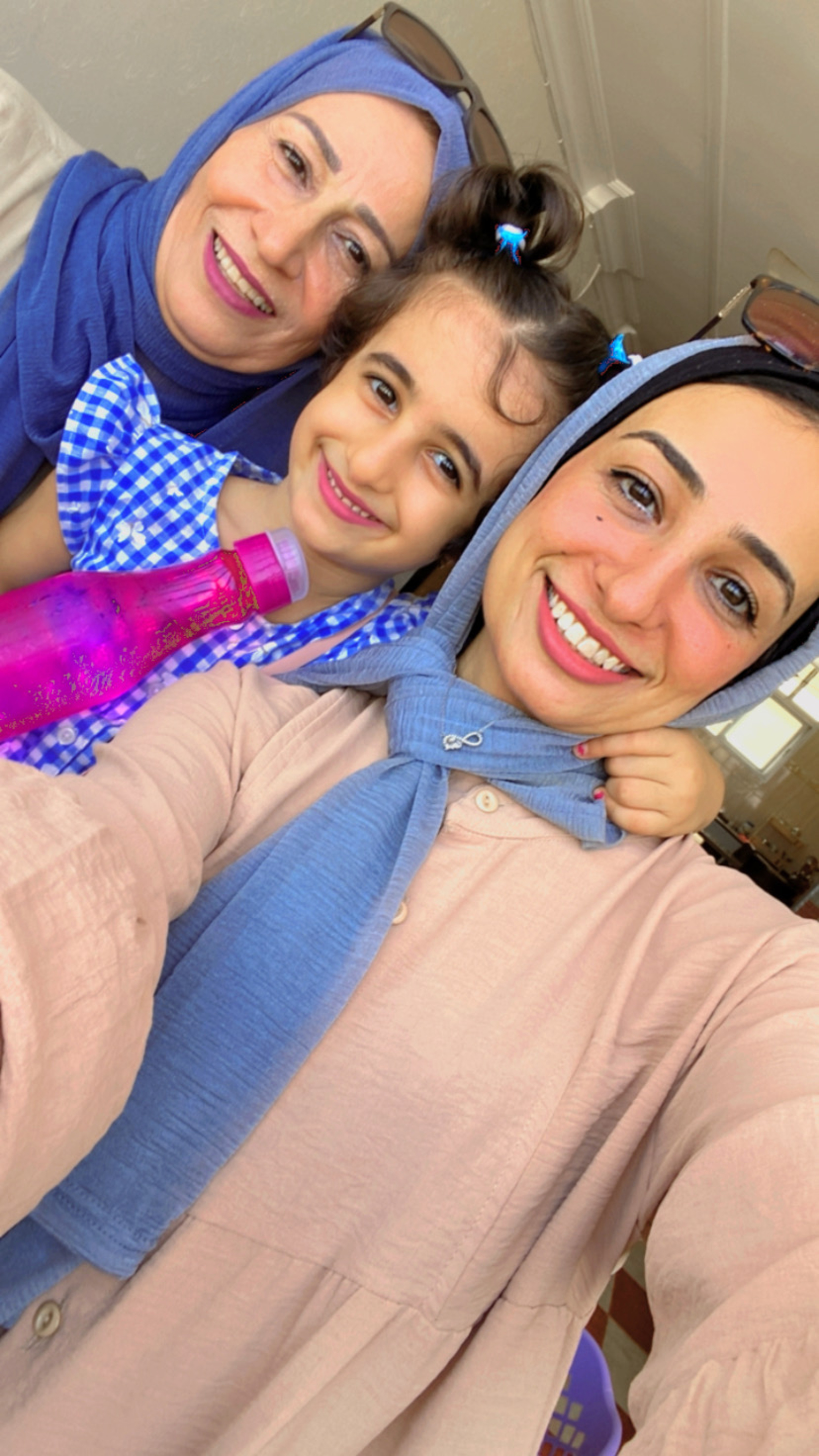 Israa with her mother Amal and her daughter Marlin 