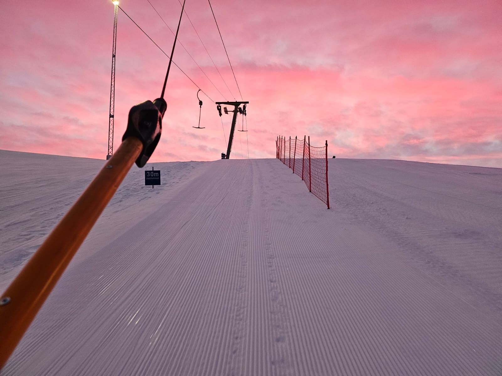 The sunset on a ski slope 