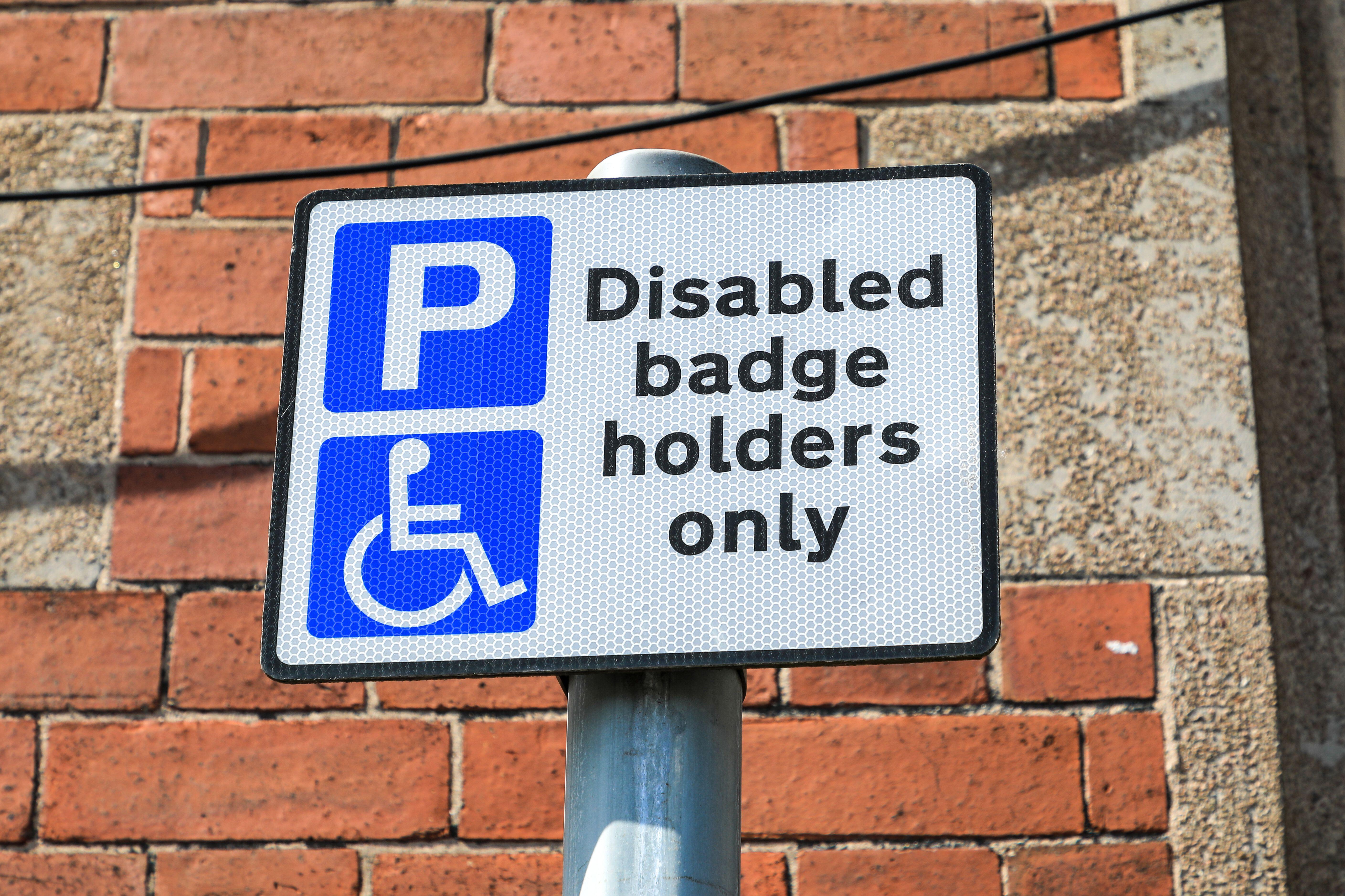 A sign saying 'disabled badge holders only'
