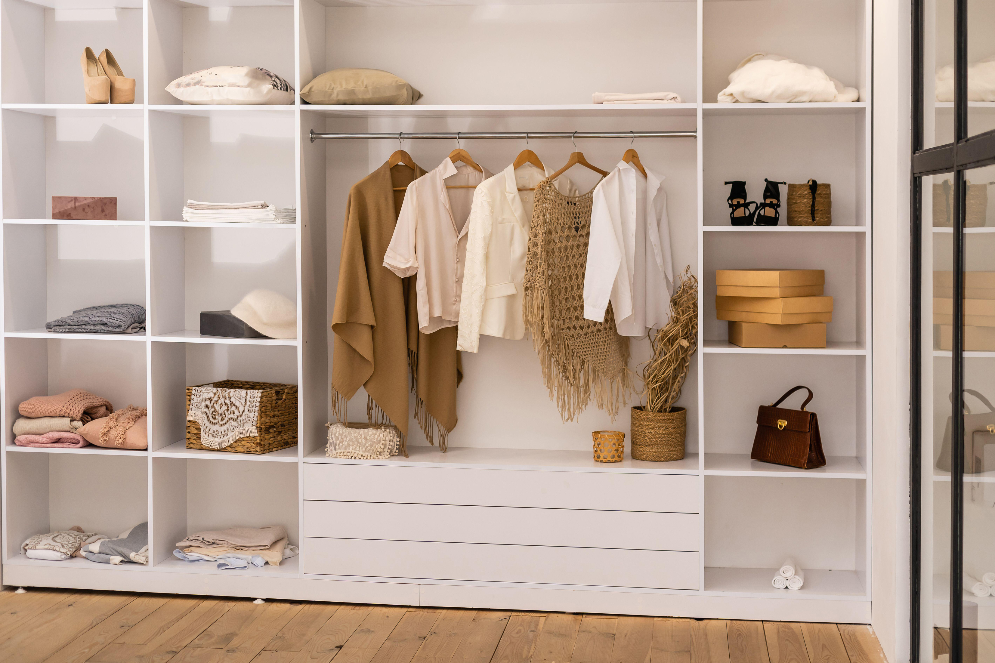 Tidy fitted wardrobe with ample storage and shelving