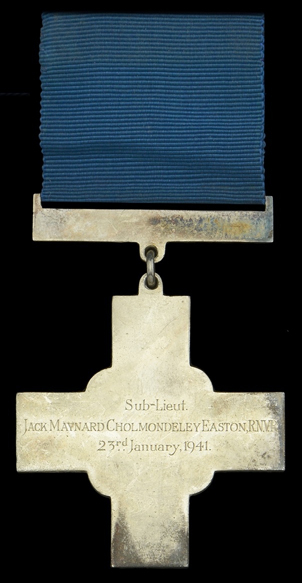 An image of the George's Cross medal engraved with Sub Lt Easton's name