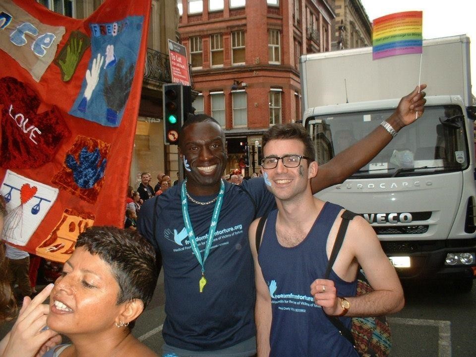 Same-sex couple taking part in a Pride event