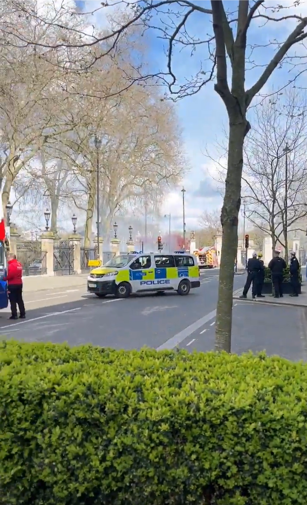 Police van on Buckingham Gate attending a fire