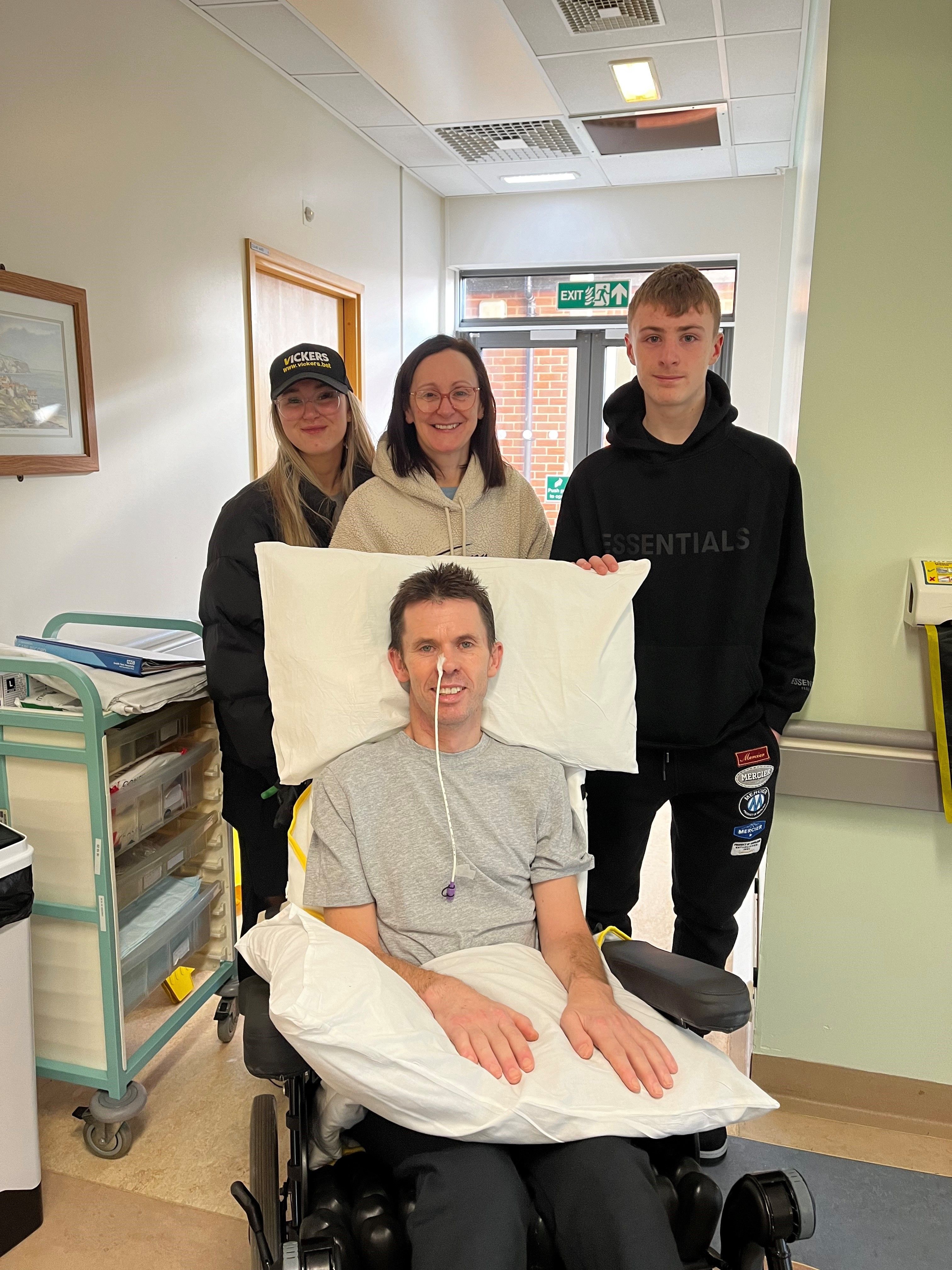 Graham Lee with son Robbie, wife Becky and daughter Amy in hospital