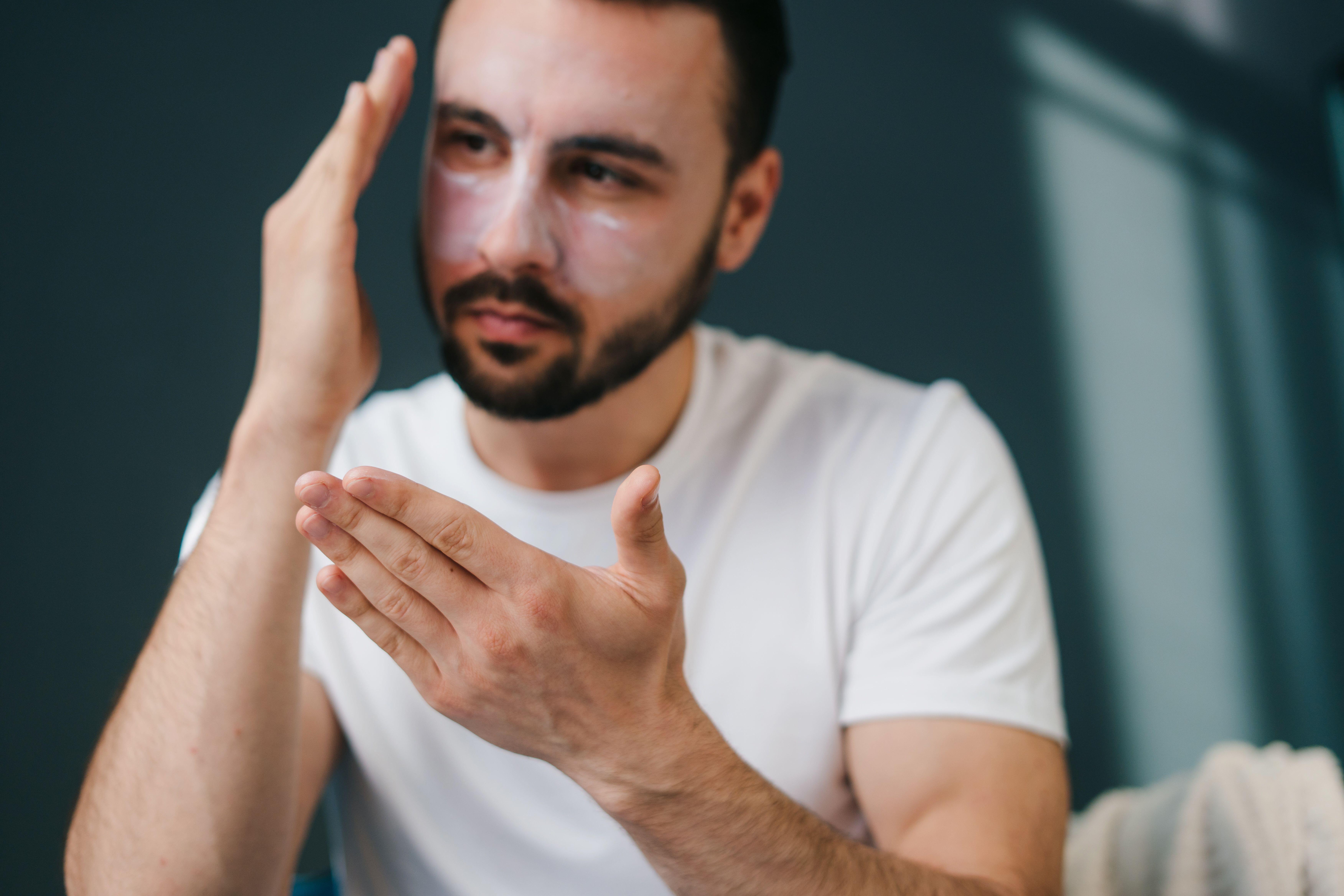 Man applying face cream