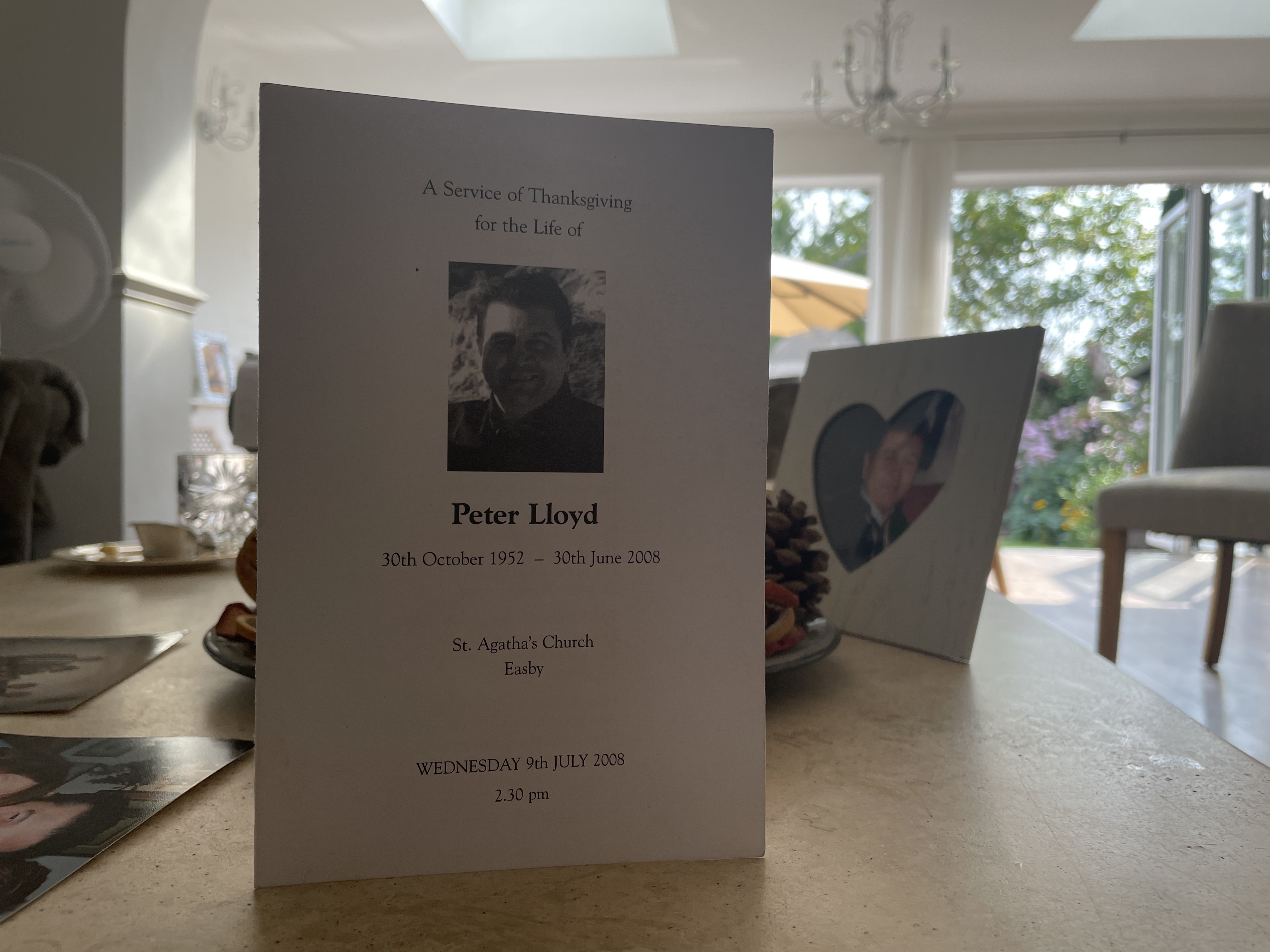 A funeral service sheet for Peter Lloyd