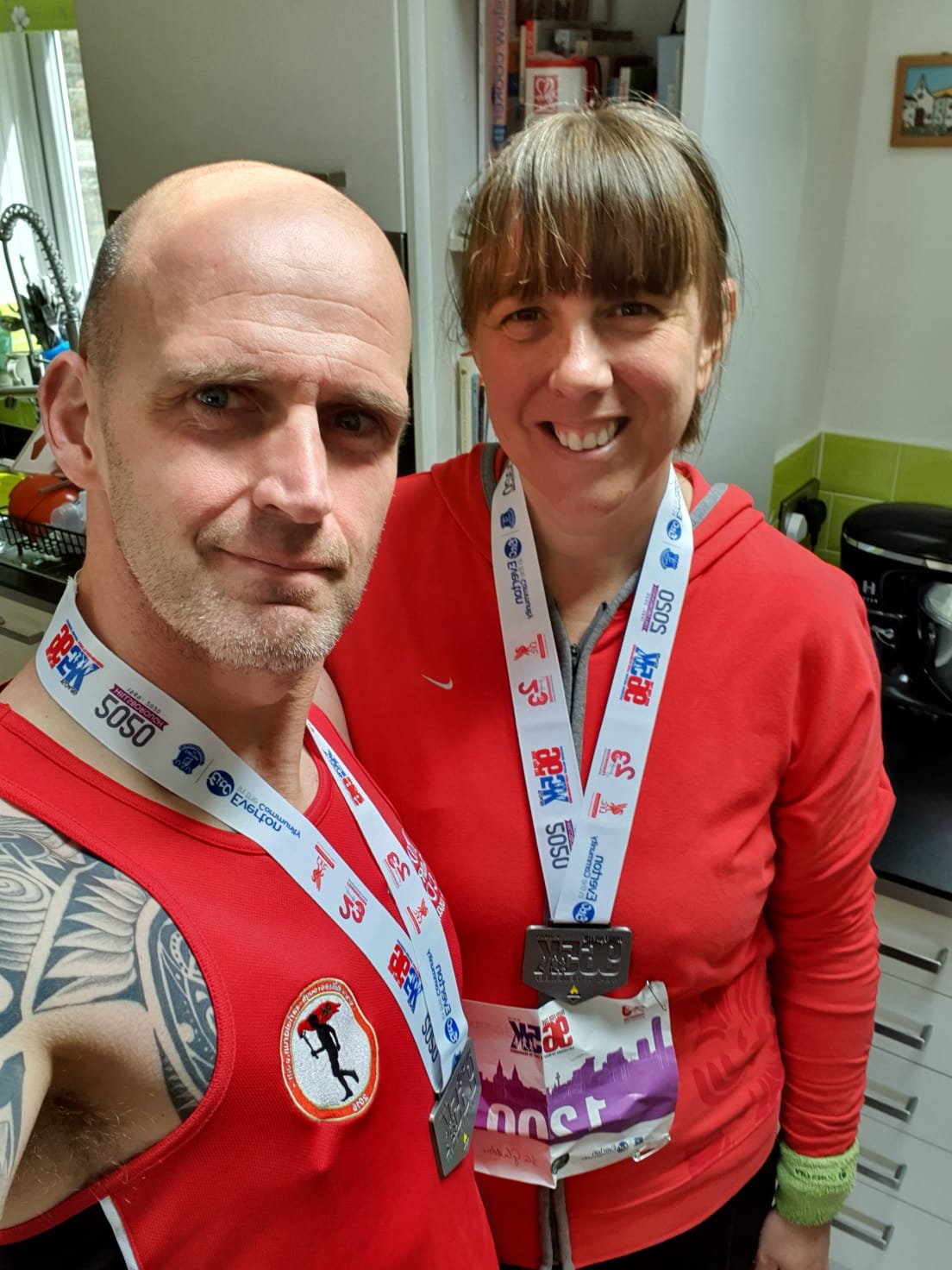 Mik Parkin, with his wife Claire, as he prepares to run from Liverpool to London to campaign for a Hillsborough Law (Mik Parkin/PA)