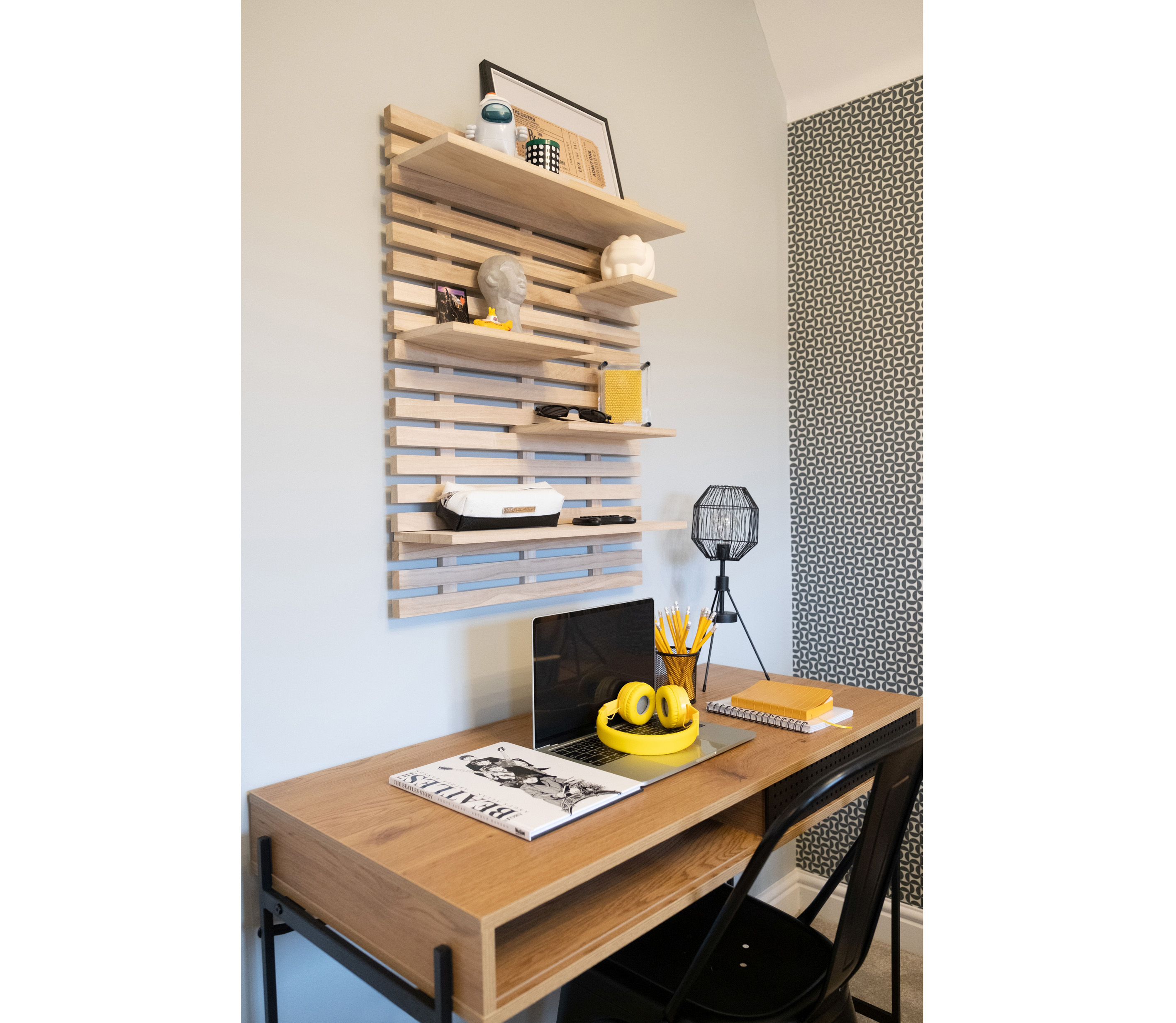 Desk with vertical wall storage