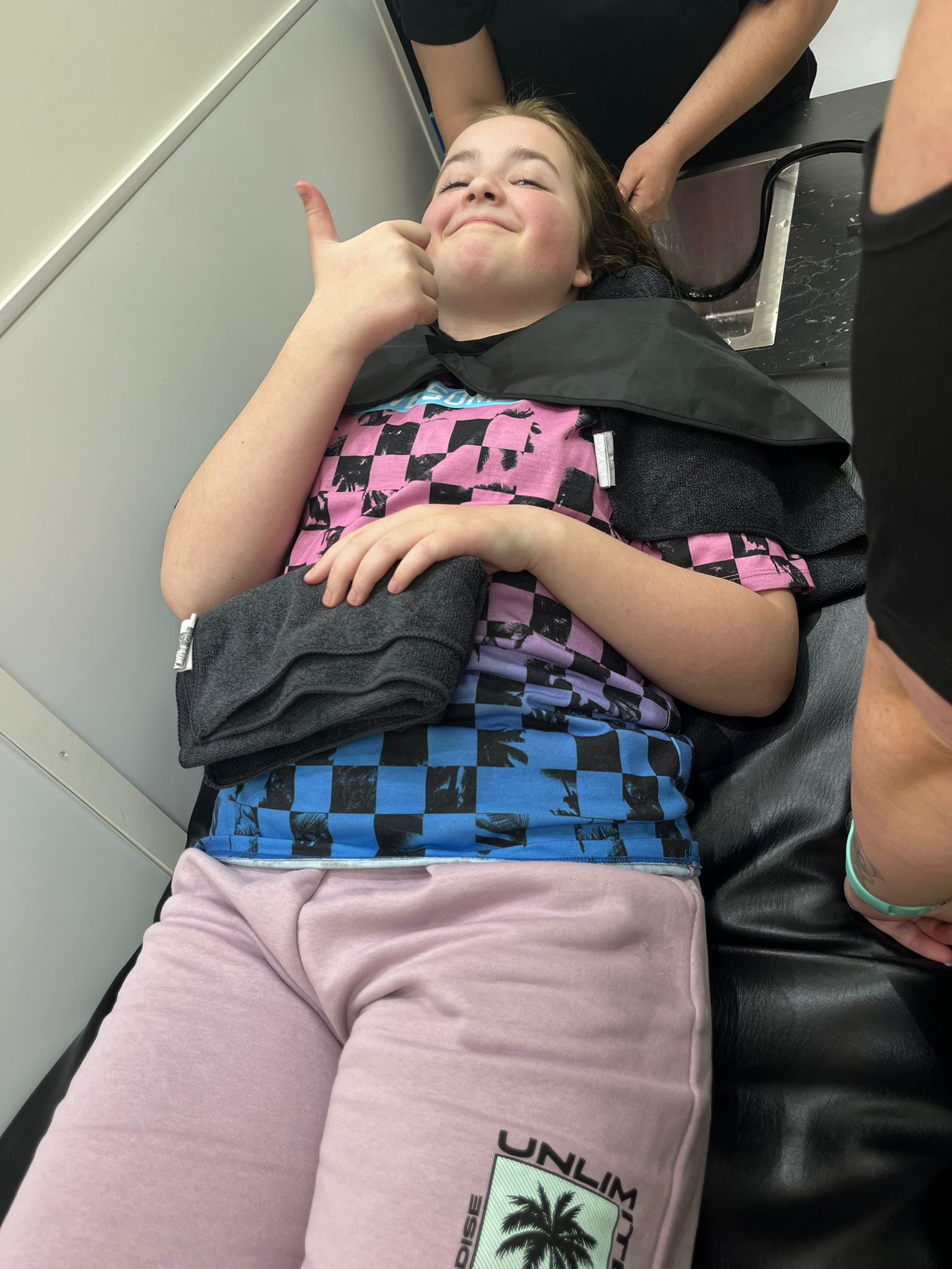 Girl, 10, feels ‘proud’ after cutting off 13 inches of hair to make