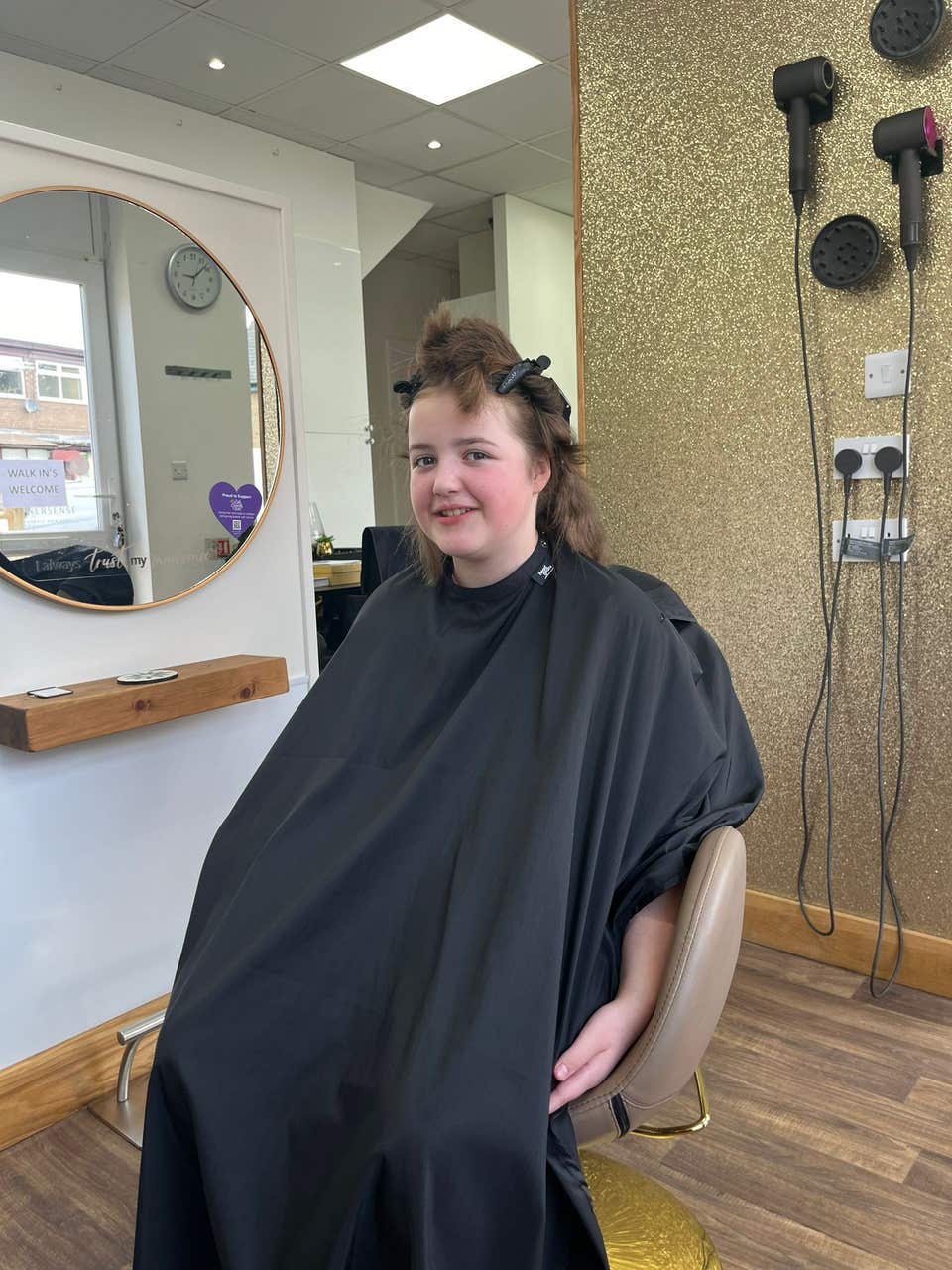 Girl, 10, feels ‘proud’ after cutting off 13 inches of hair to make