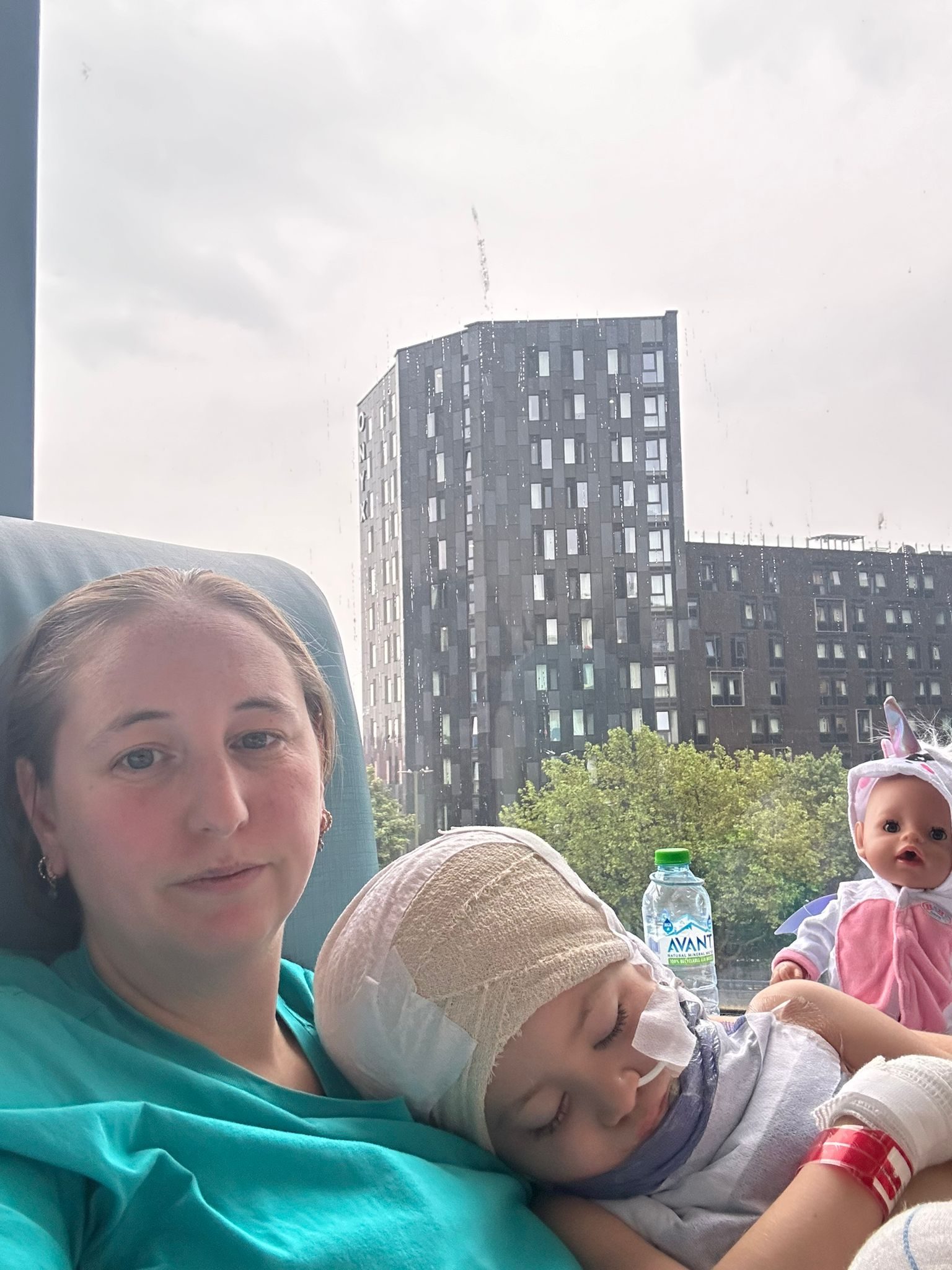 Charlotte Woodman with her daughter Tay in hospital