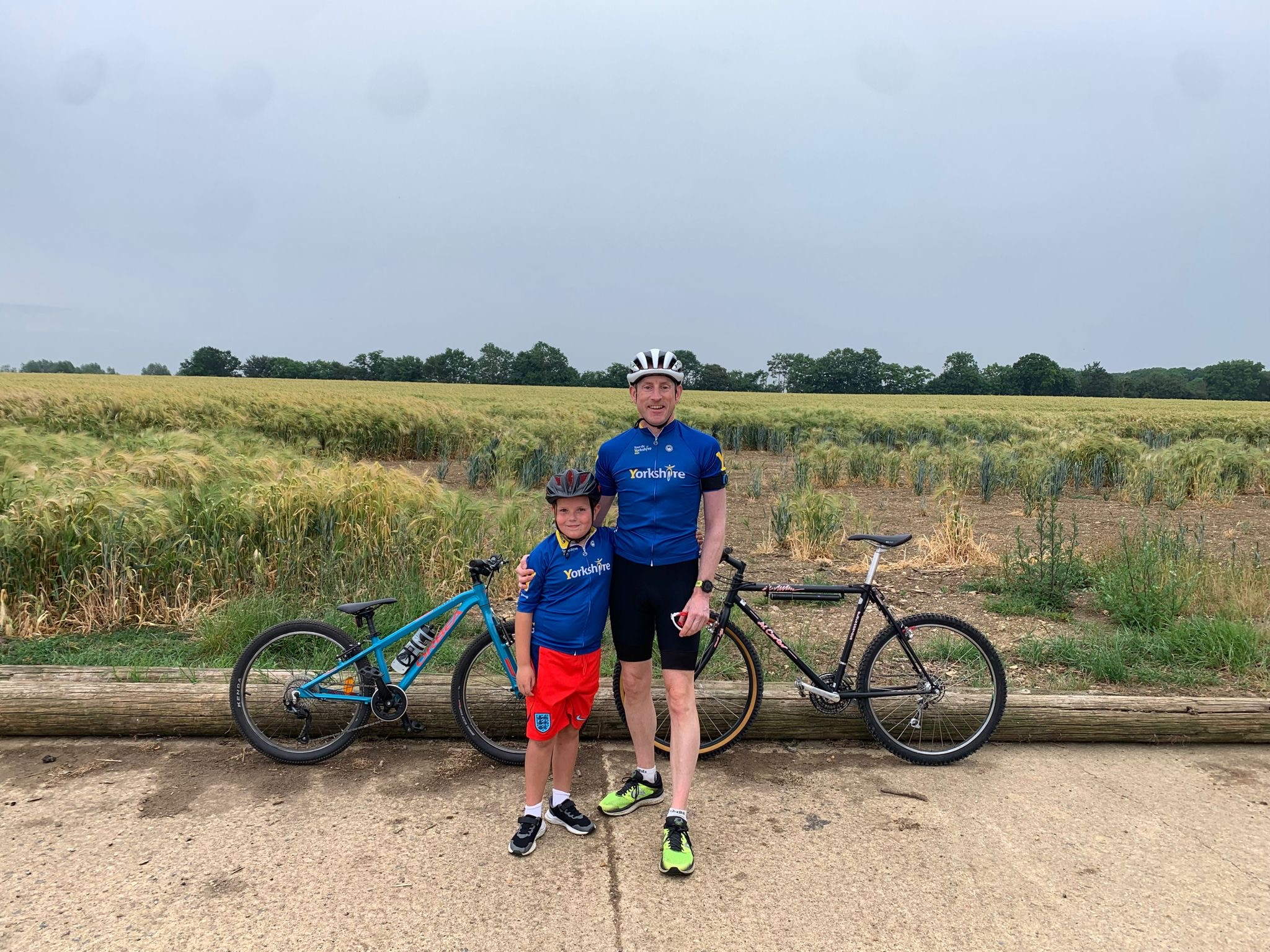 Jonathan Muggleton cycling with his son