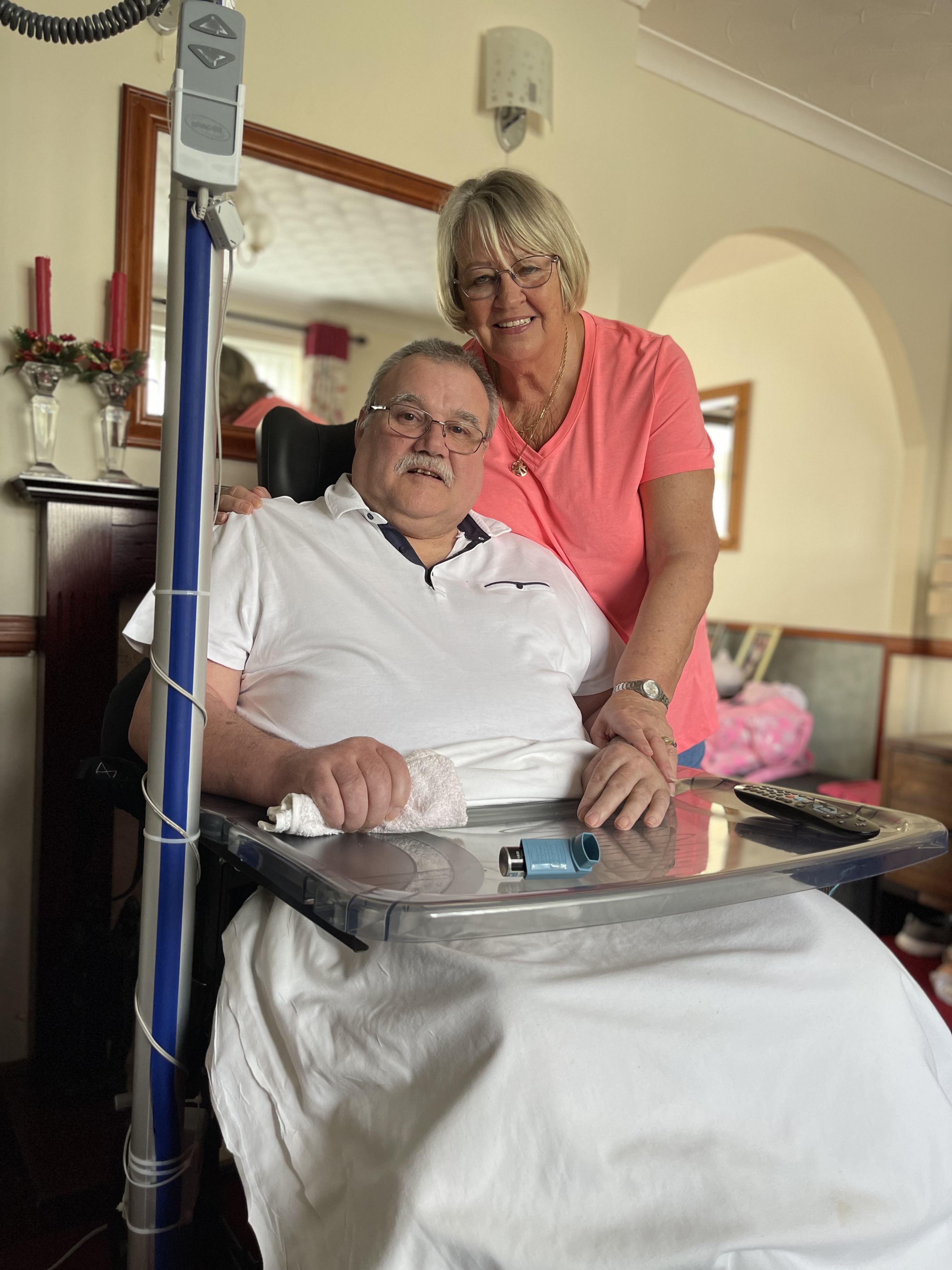 Keith Parry and his wife Linda after he suffered a serious stroke in 2021 (Band of Builders/PA)