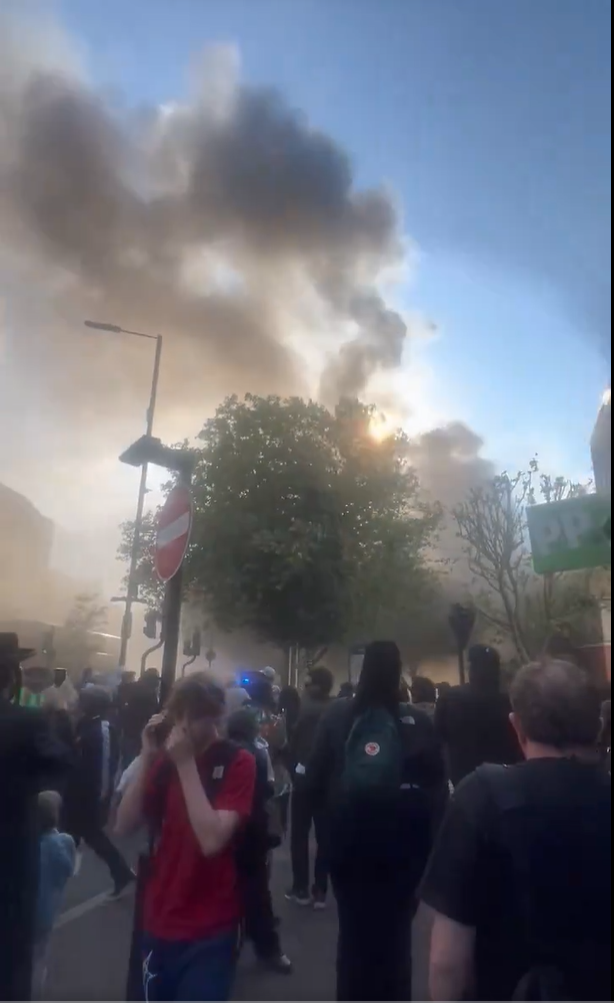 Smoke billows from a building in Hackney