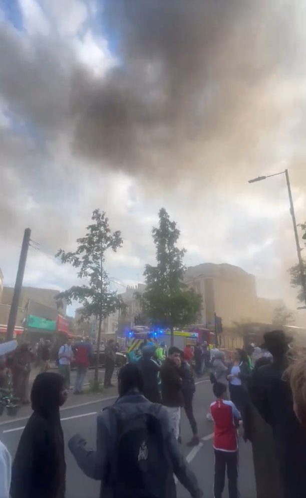 Smoke billows from a building in Hackney