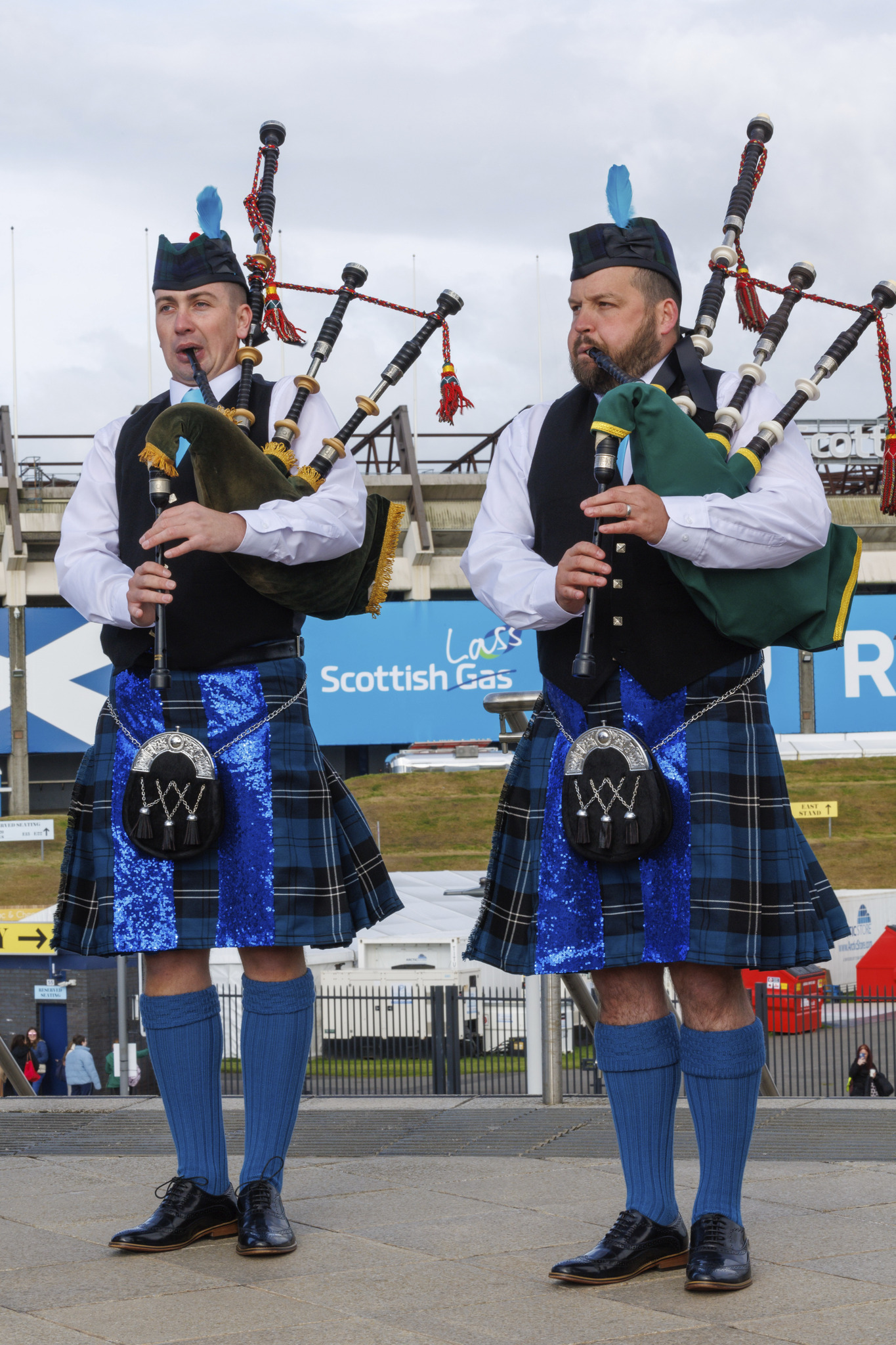 People playing the bagpipes outside Murrayfield Stadium