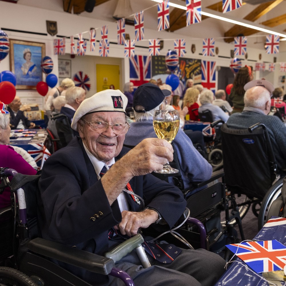 Albert Lamond, 98, enjoys the D-Day party where he was a guest of honour 