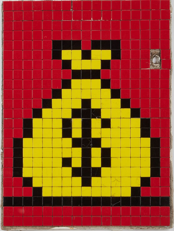A pixilated money bag created by street artist invader