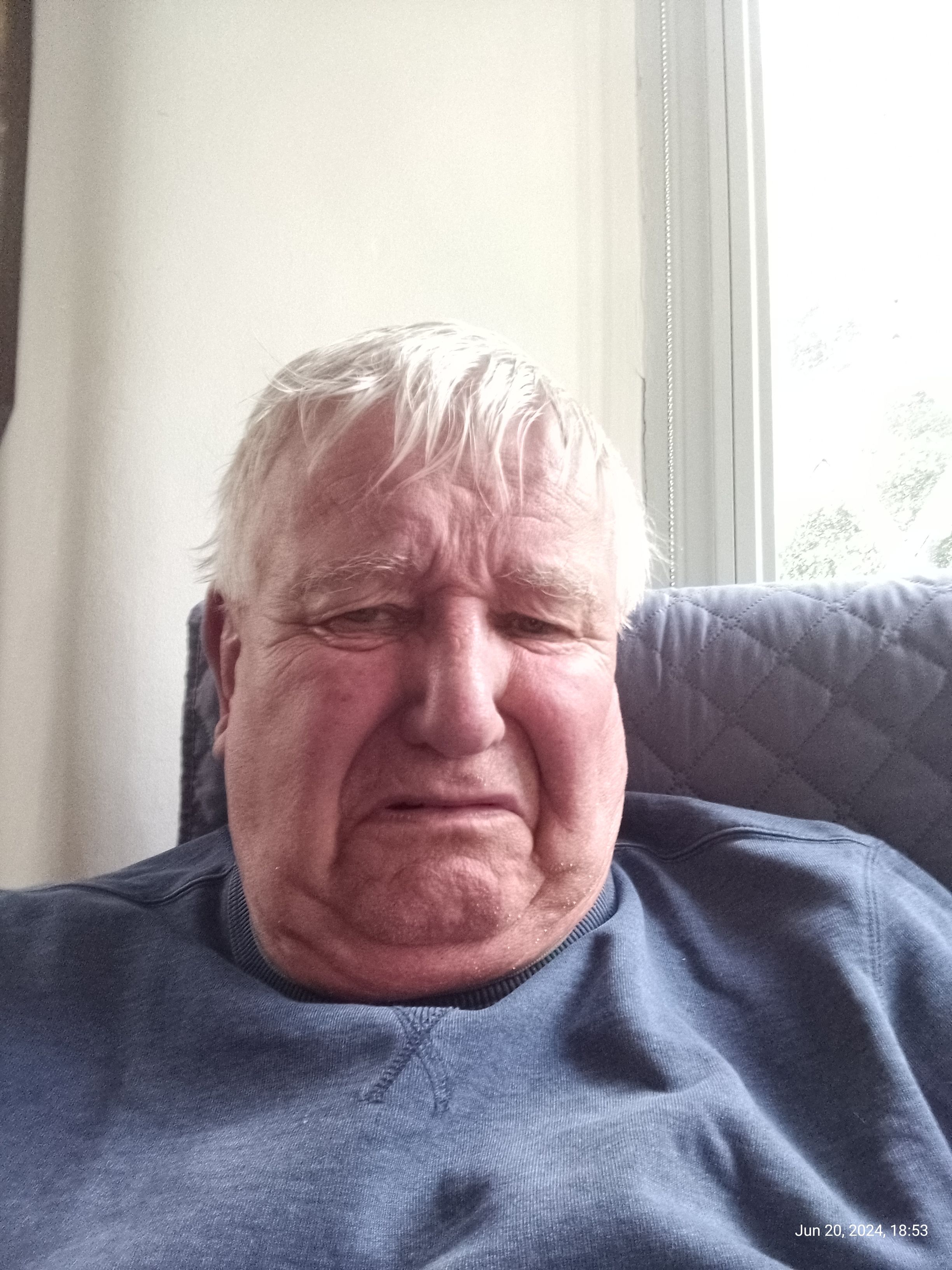 Elderly man looks sad after seeing the results of the England v Denmark Euro match