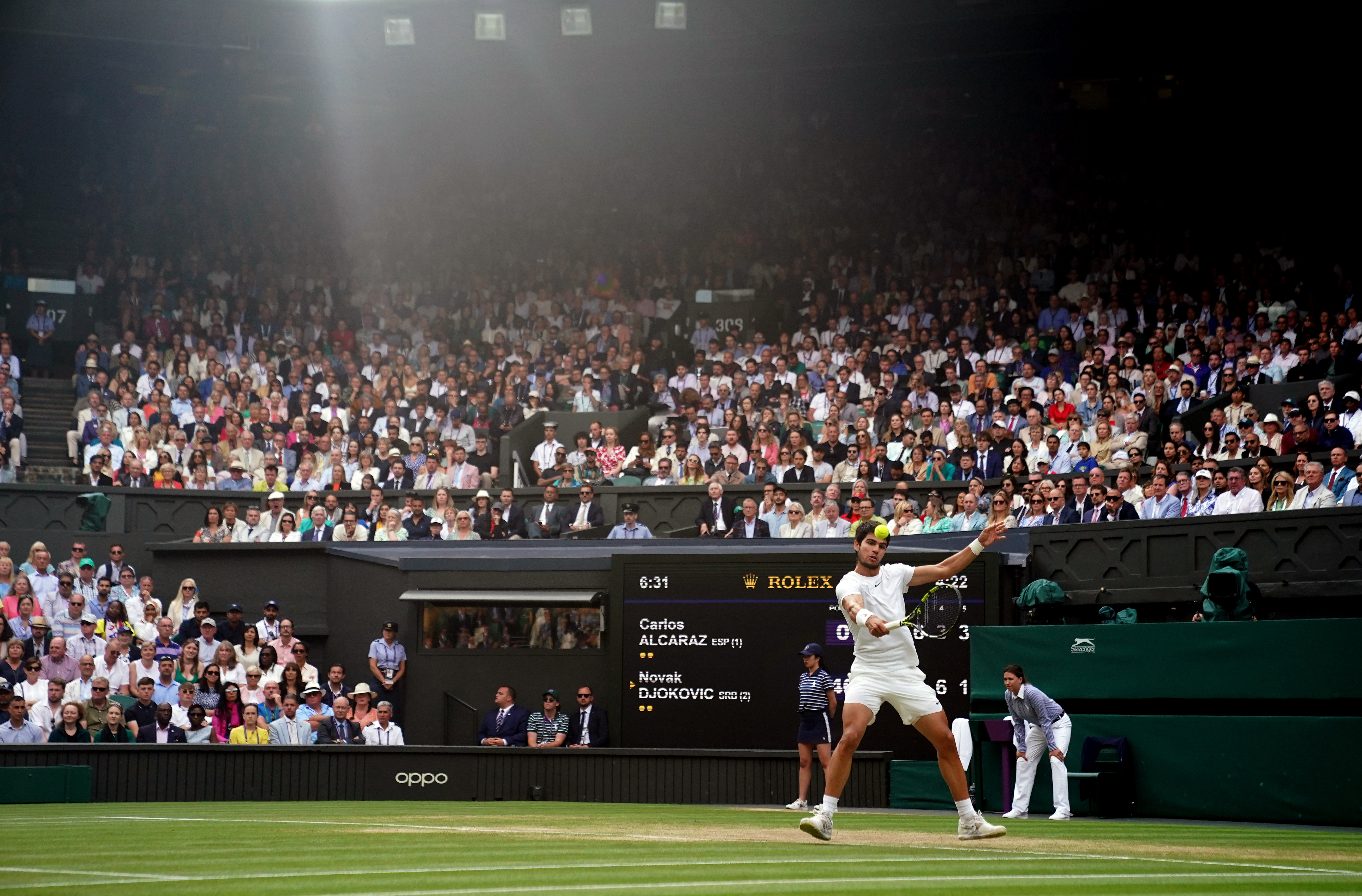 Carlos Alcaraz in action against Novak Djokovic in the 2023 Wimbledon men's final