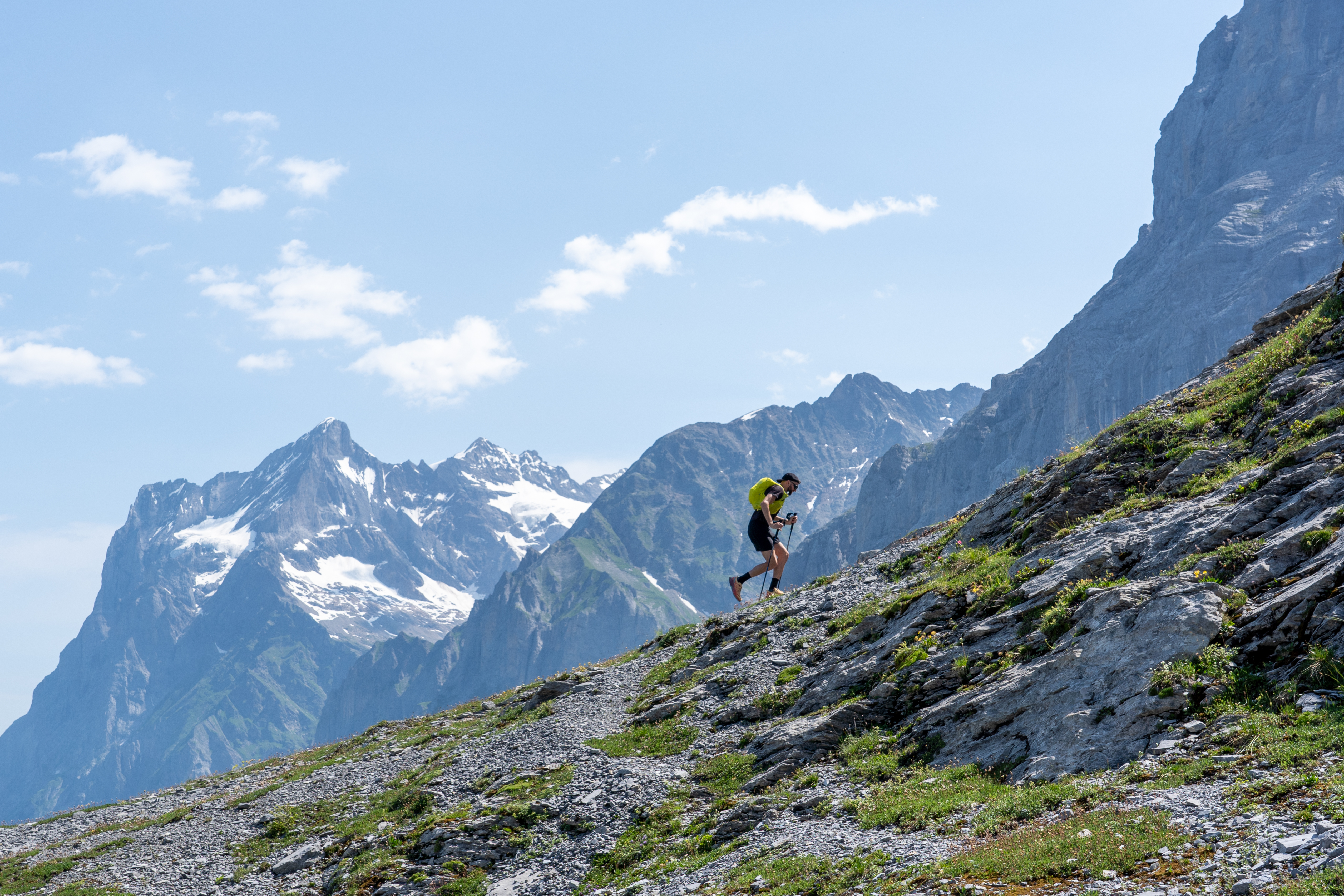 Jake Catterall running along the side of a mountain in Switzerland
