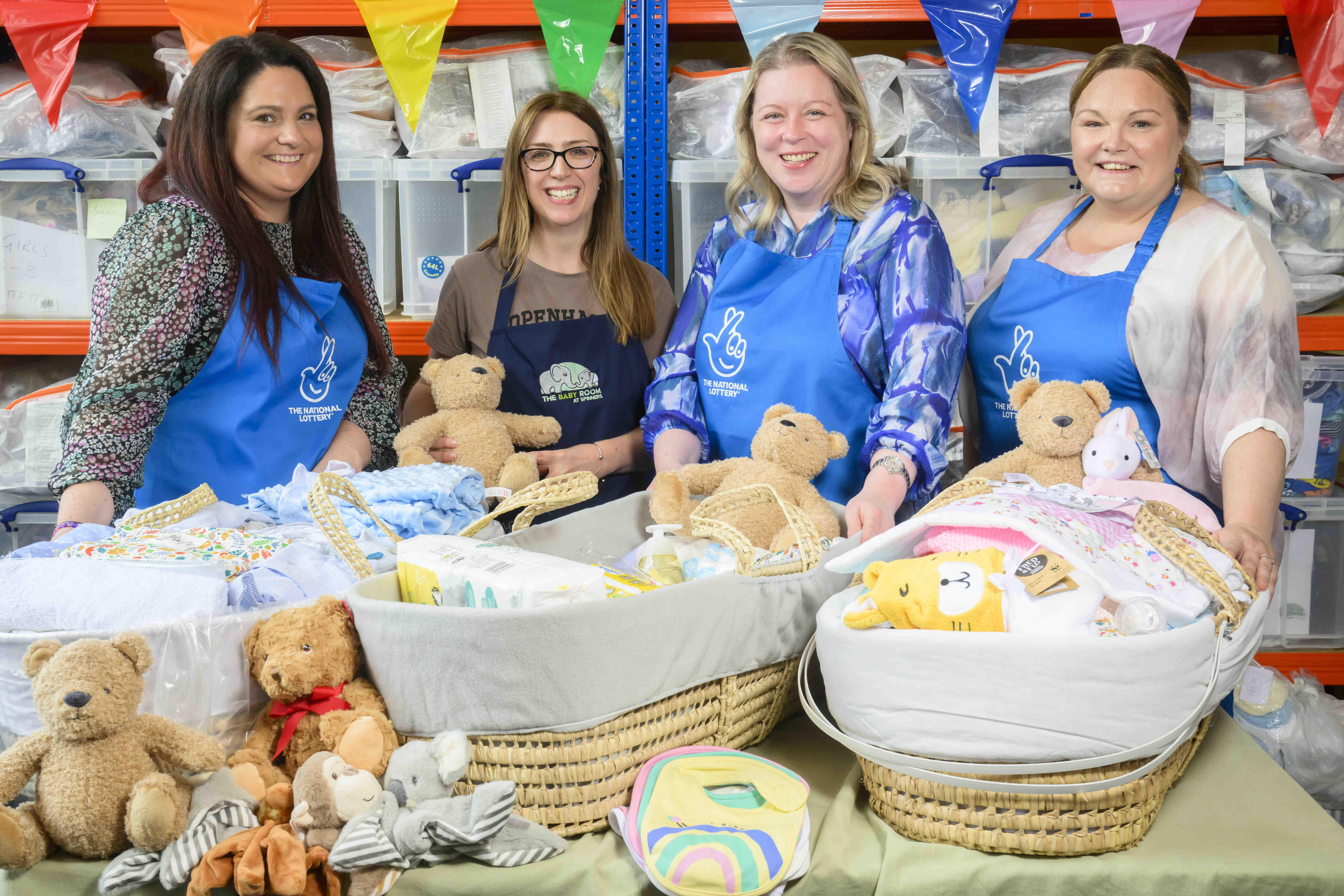 Ruth Breen (second from right) with fellow lottery winners Emma Cartwright (left) and Annette Dawson (right) and The Baby Room charity founder Alison Wakefield (Anthony Devlin/PA)